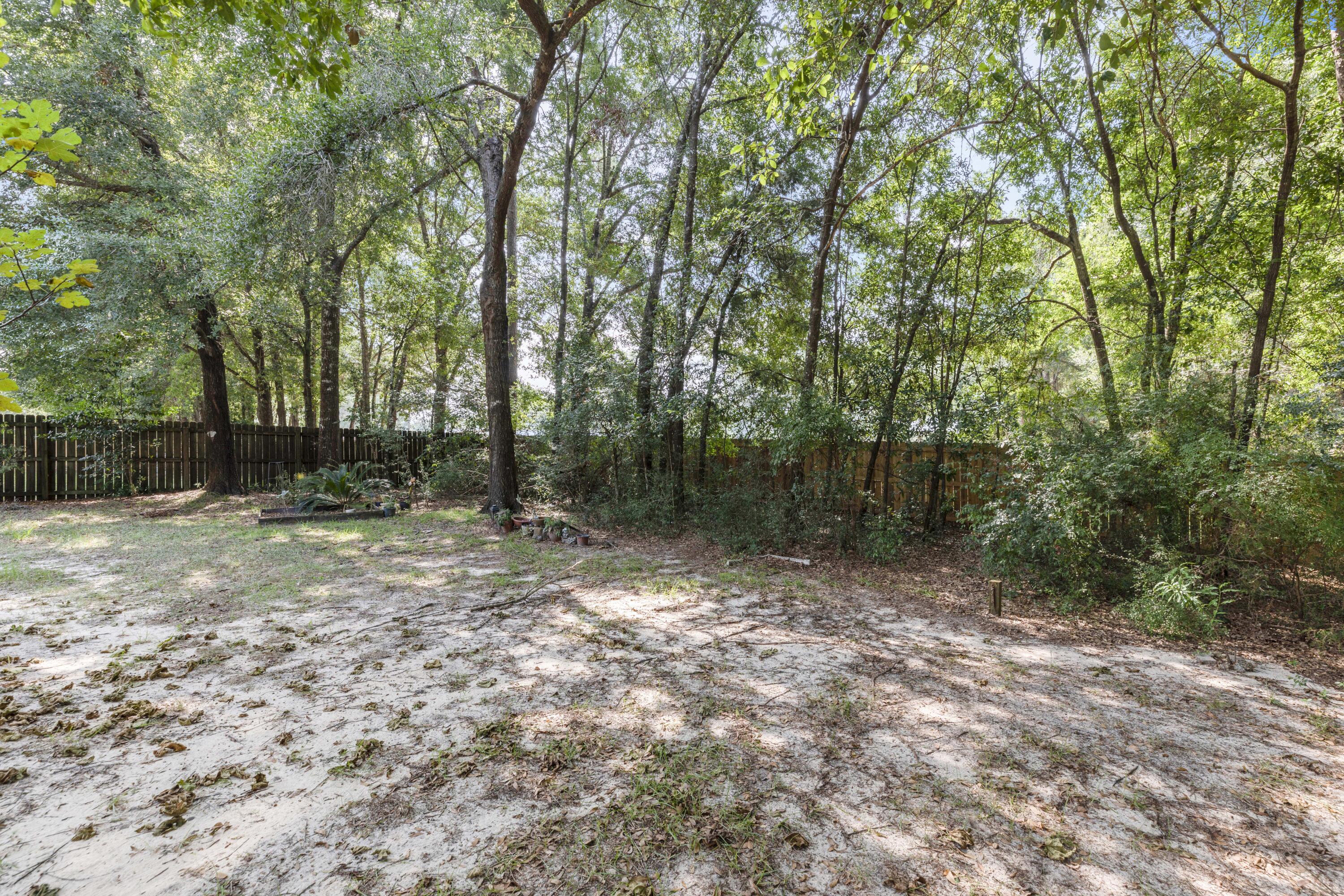 2864 Soles Lane Crestview, FL 32539 - Photo 9 of 32 a view of outdoor space with trees