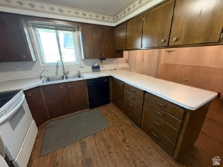 588 North 4500 West West Point, UT 84015 - Photo 17 of 61 Kitchen featuring wood-finish flooring and extensive cabinetry with white countertops