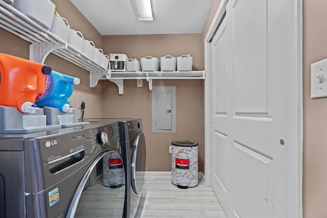 a utility room with dryer and washer