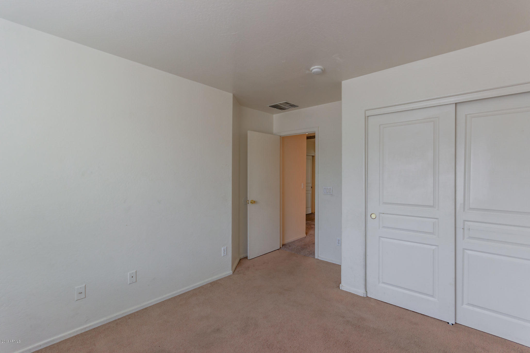 4332 West Maldonado Road Laveen, AZ 85339 - Photo 15 of 21 a view of an empty room