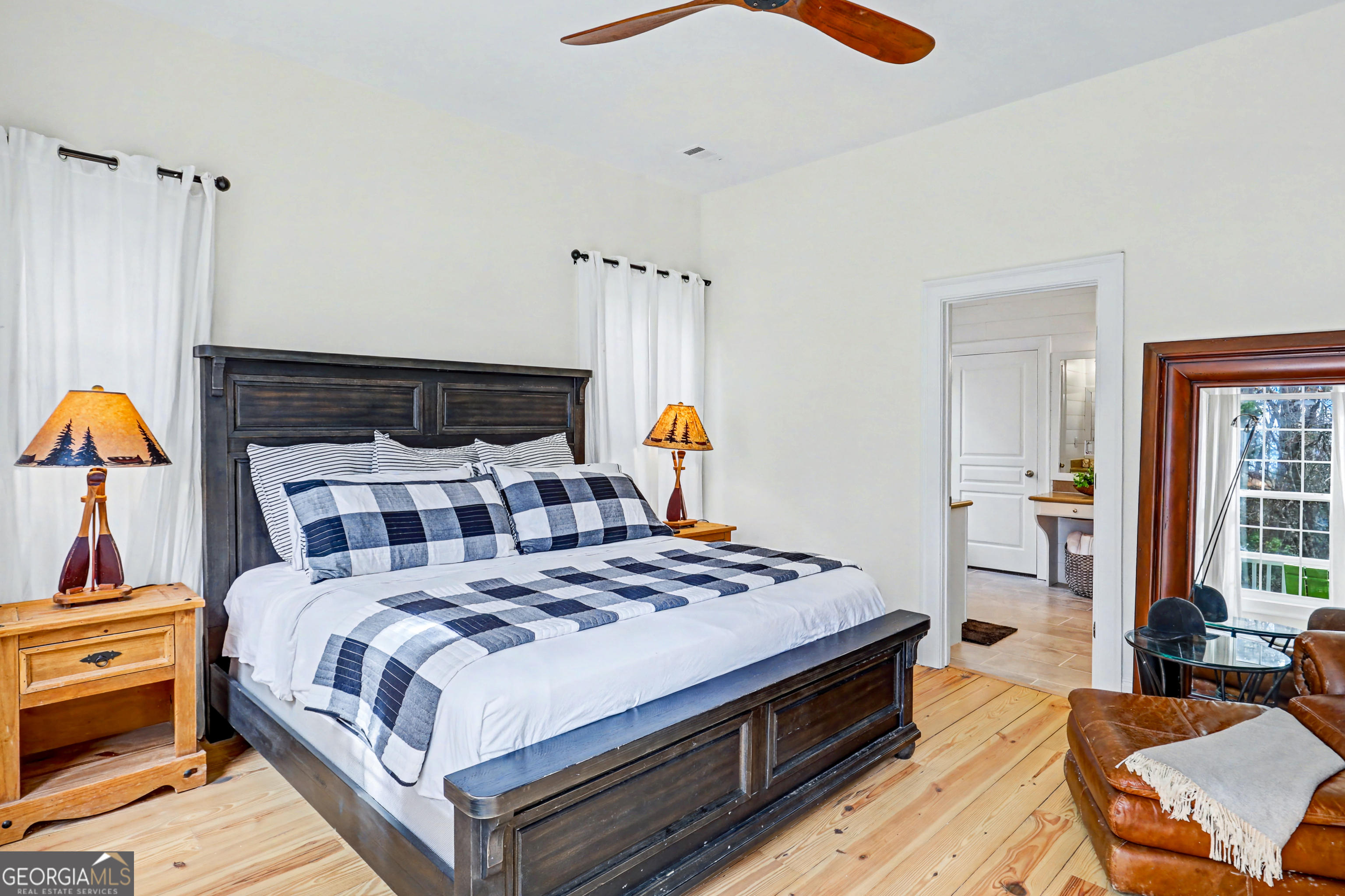 336 Fulton Road Tiger, GA 30576 - Photo 23 of 52 a bedroom with a bed and dresser