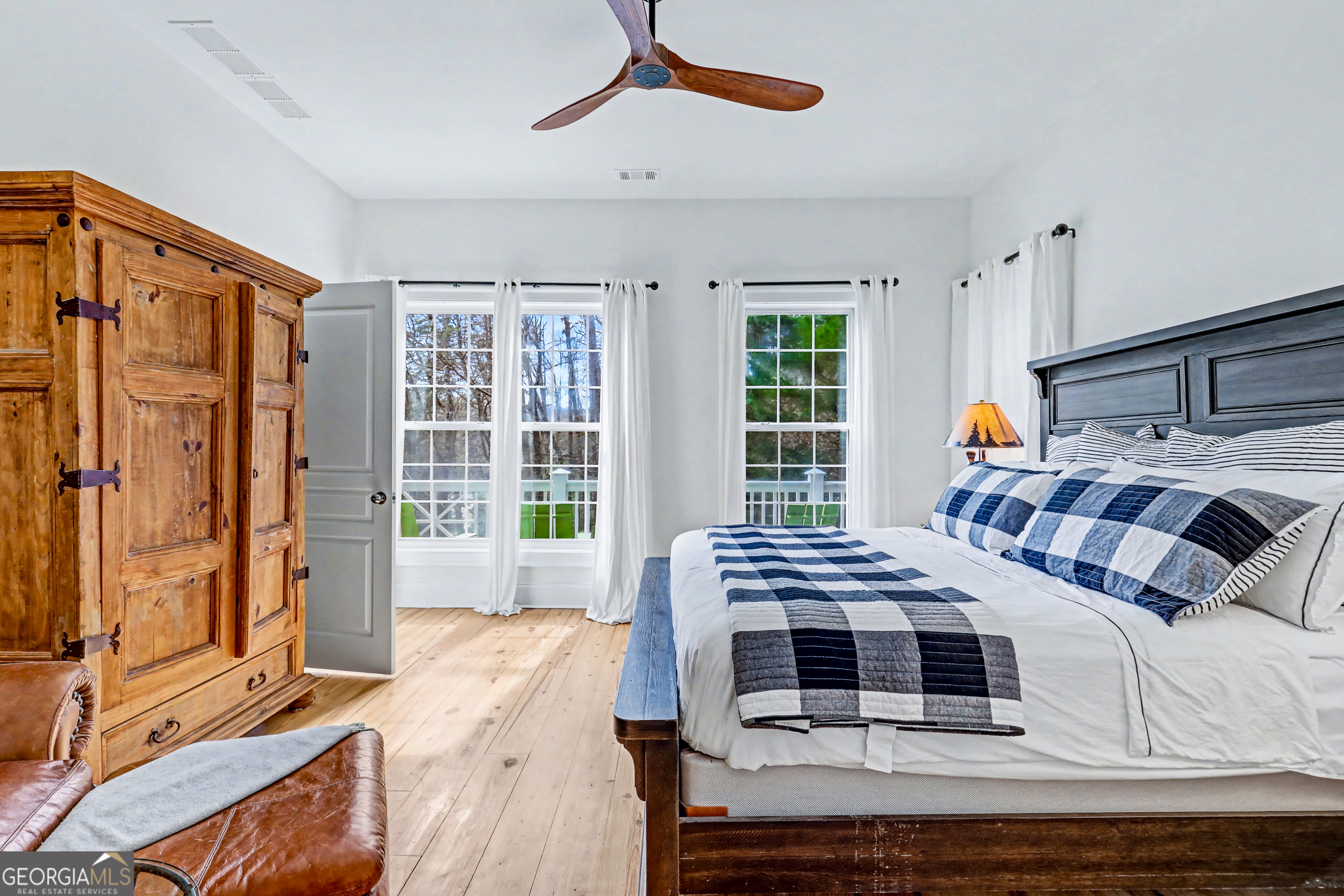 336 Fulton Road Tiger, GA 30576 - Photo 24 of 52 a bedroom with furniture and a window