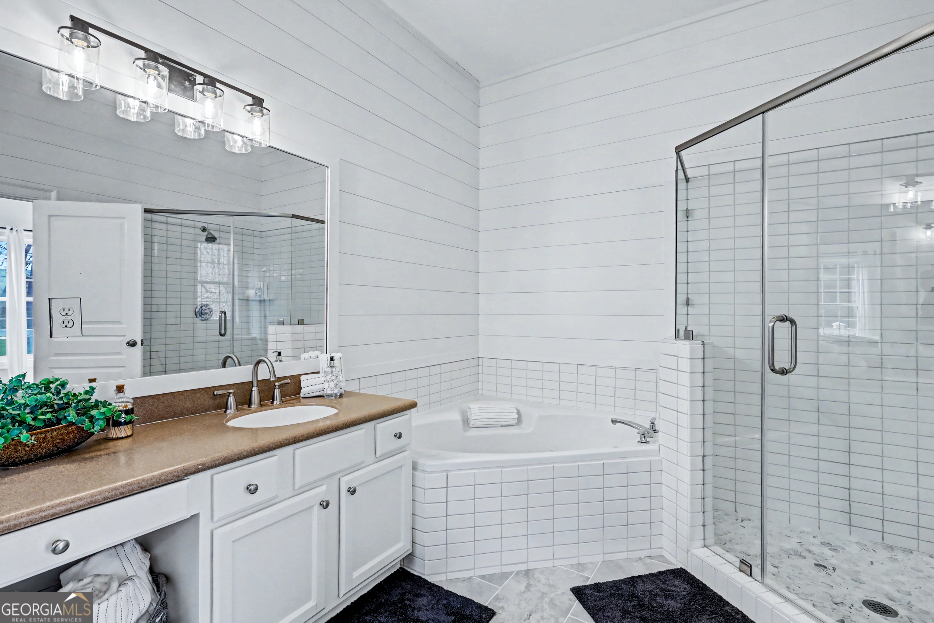 336 Fulton Road Tiger, GA 30576 - Photo 25 of 52 a bathroom with a sink a shower and a mirror
