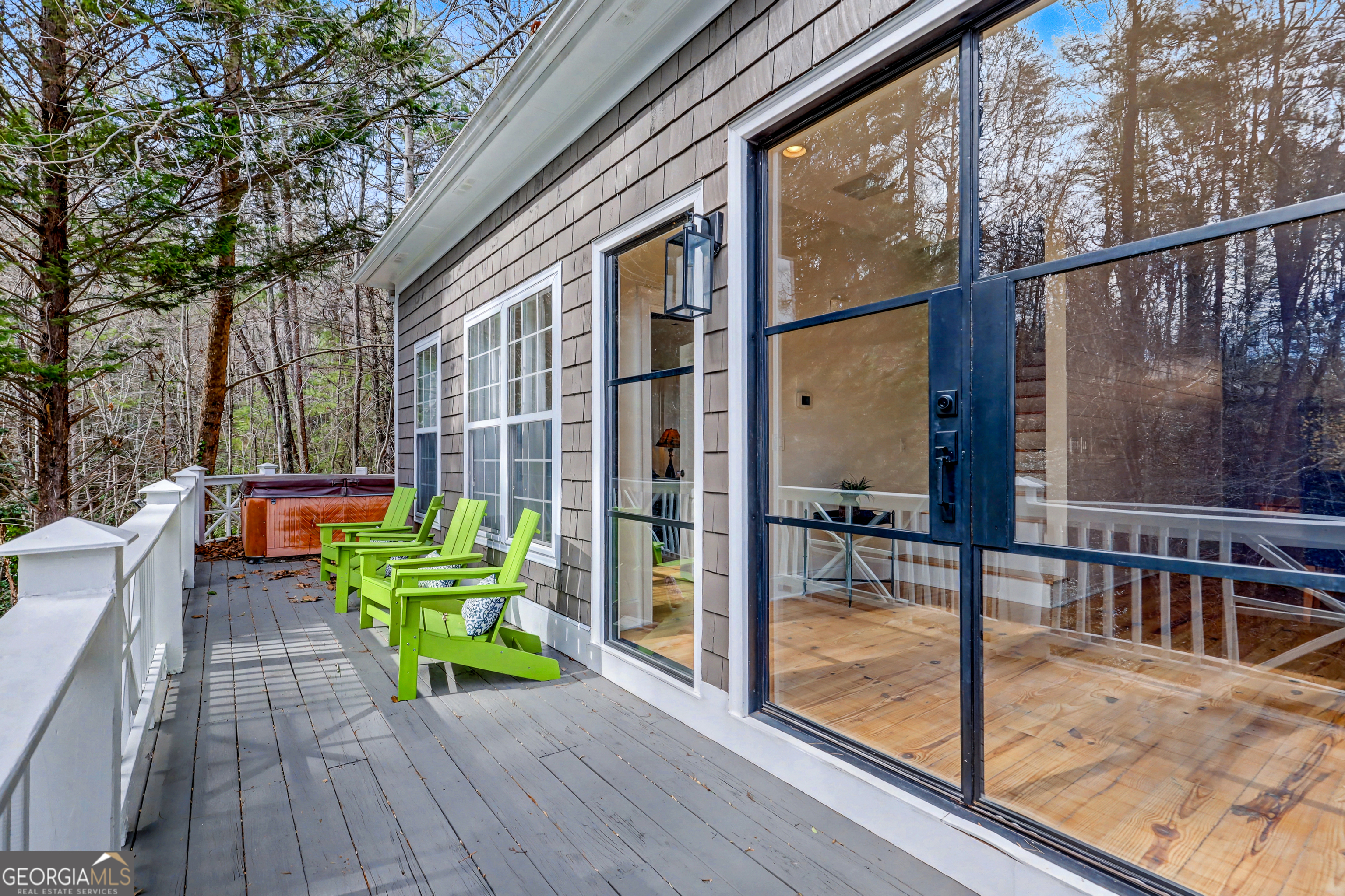 336 Fulton Road Tiger, GA 30576 - Photo 30 of 52 a view of a balcony with chairs