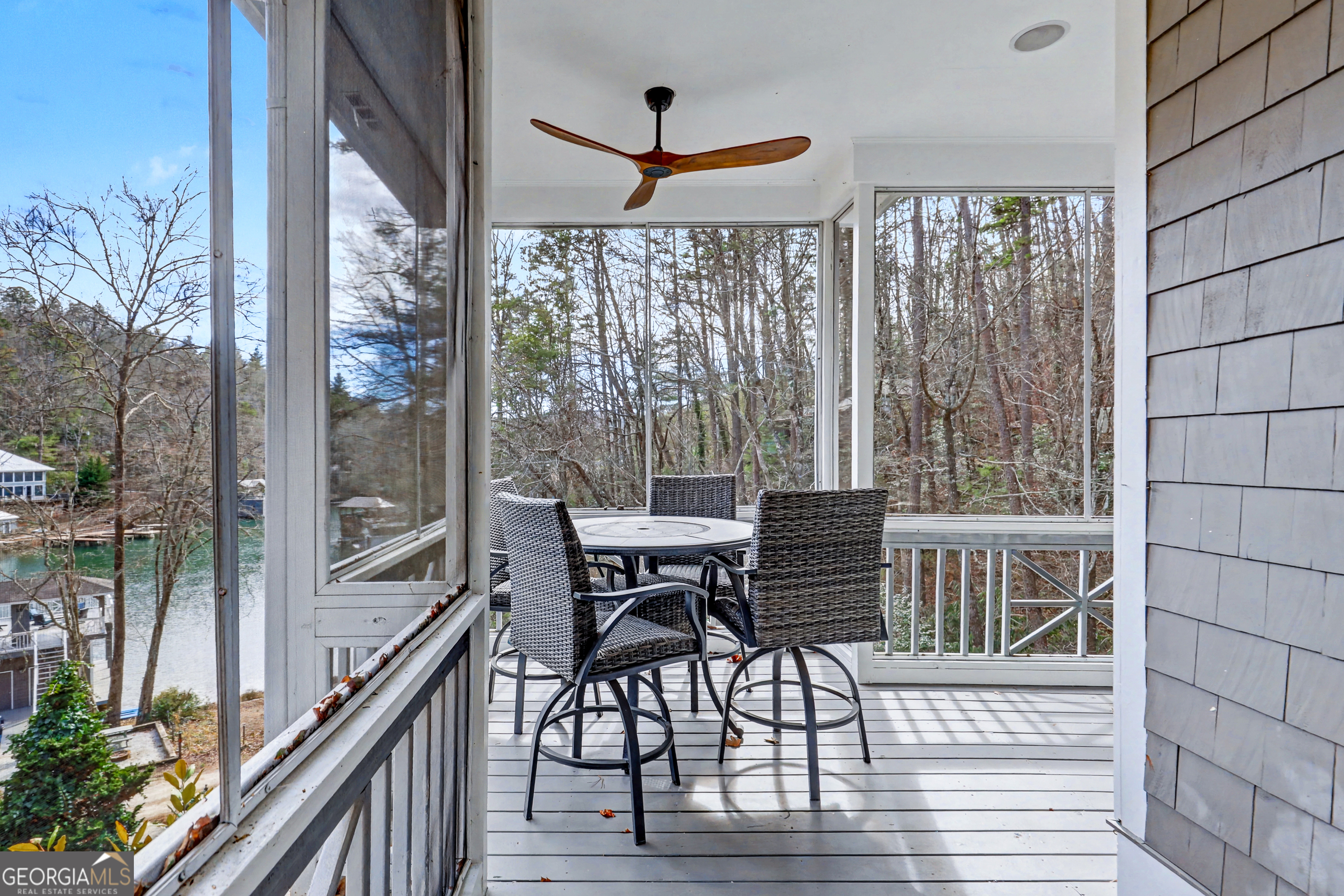 336 Fulton Road Tiger, GA 30576 - Photo 32 of 52 a view of a porch with furniture and wooden floor