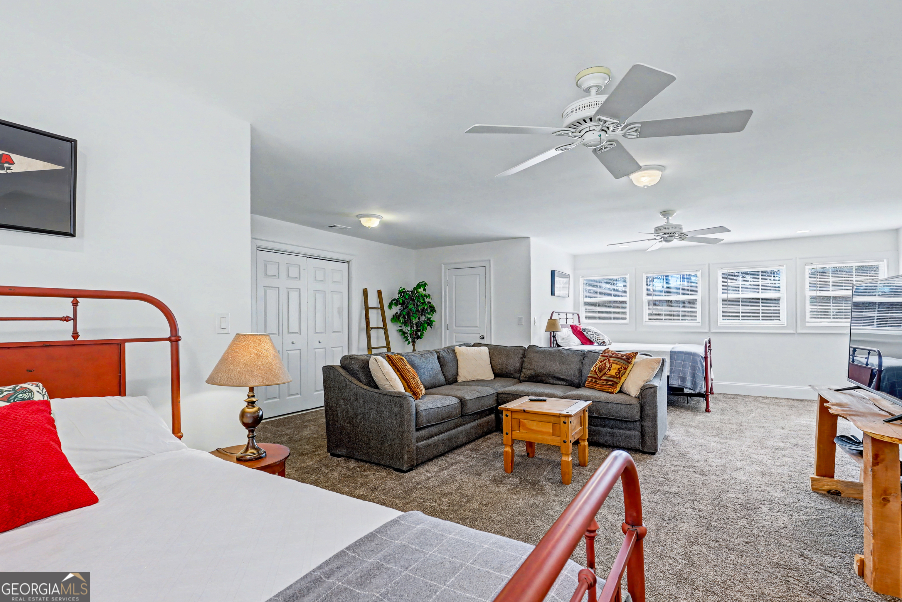 336 Fulton Road Tiger, GA 30576 - Photo 36 of 52 a living room with furniture and wooden floor