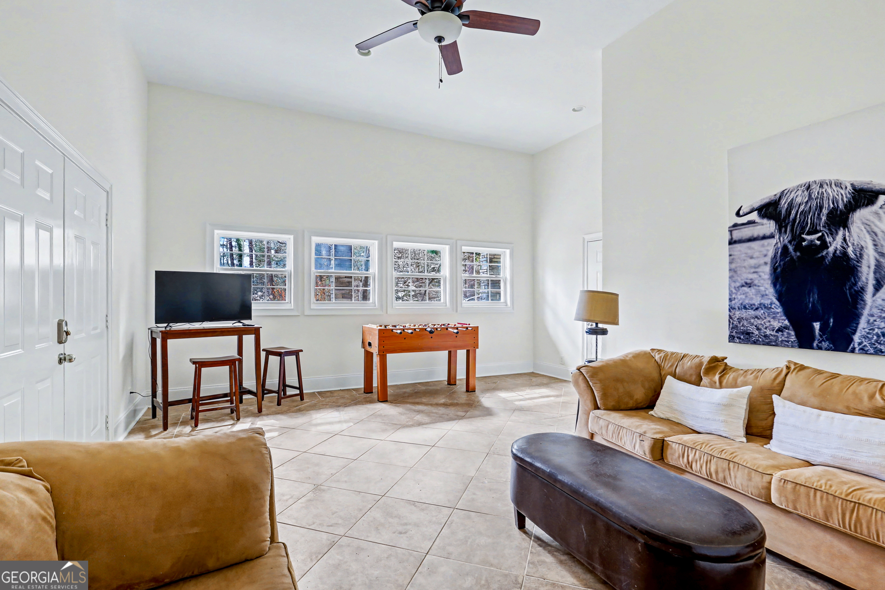336 Fulton Road Tiger, GA 30576 - Photo 40 of 52 a living room with furniture and a lamp