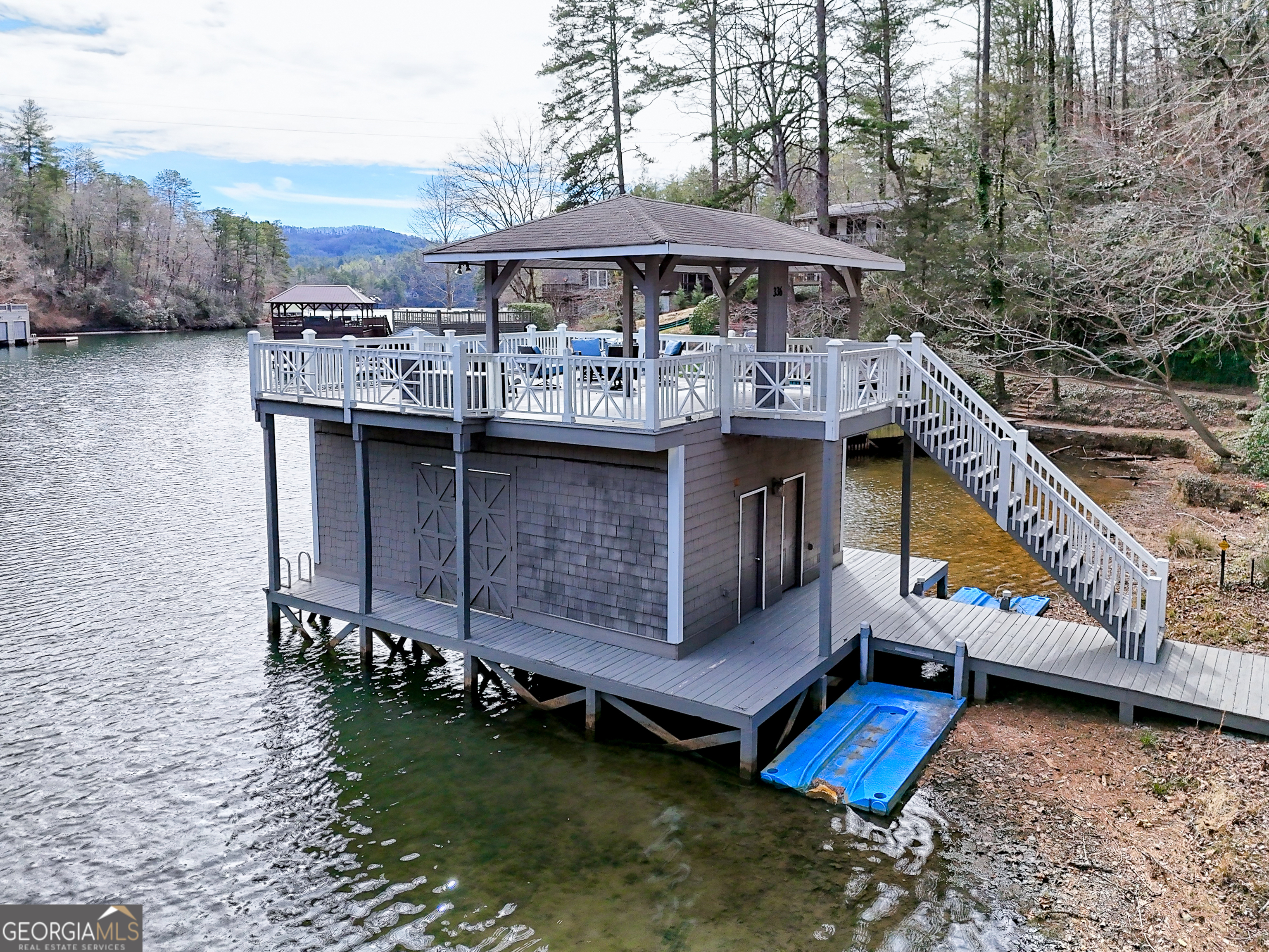 336 Fulton Road Tiger, GA 30576 - Photo 4 of 52 a view of a wooden deck with a yard