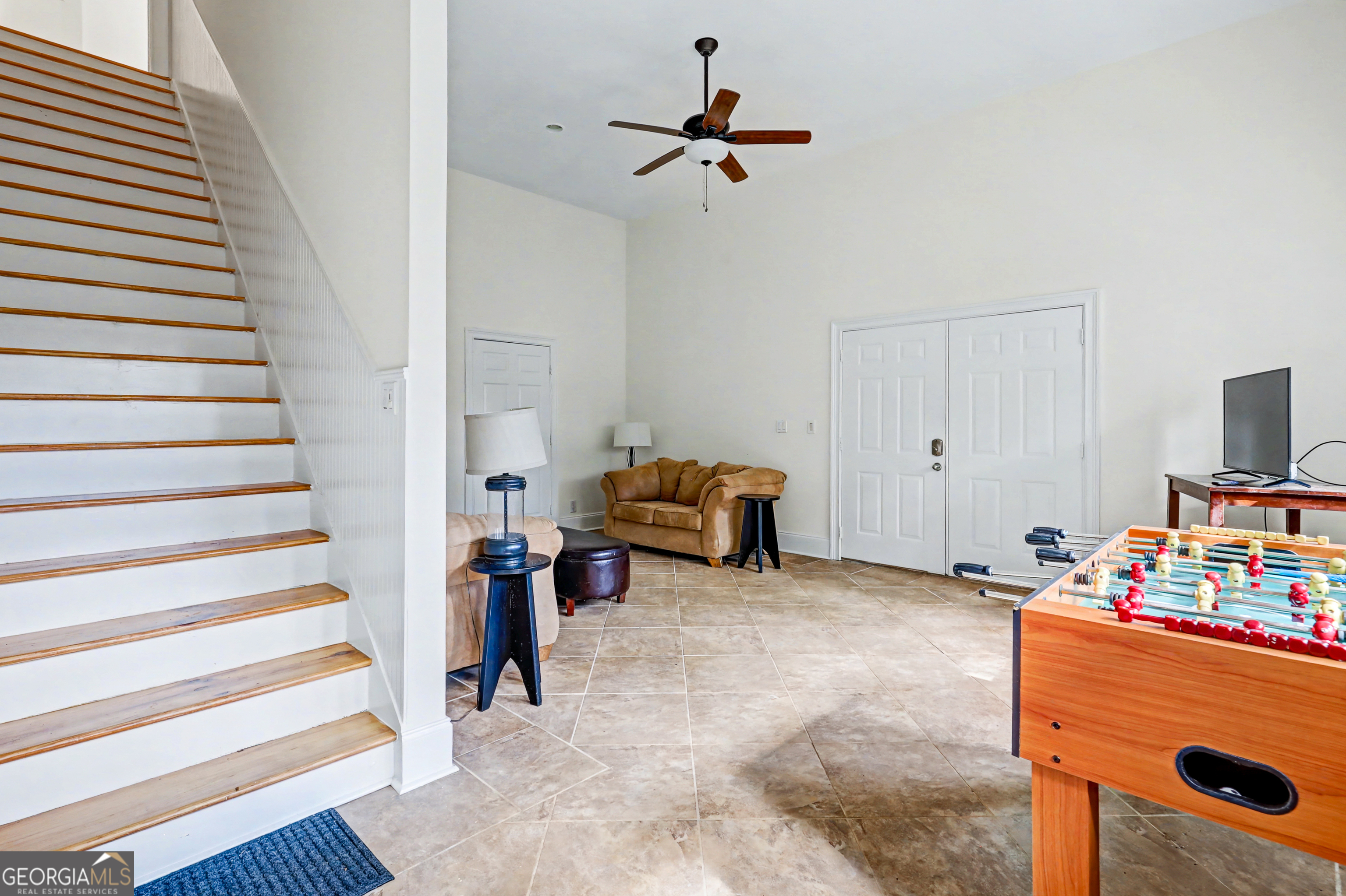 336 Fulton Road Tiger, GA 30576 - Photo 41 of 52 a living room with furniture and a chandelier