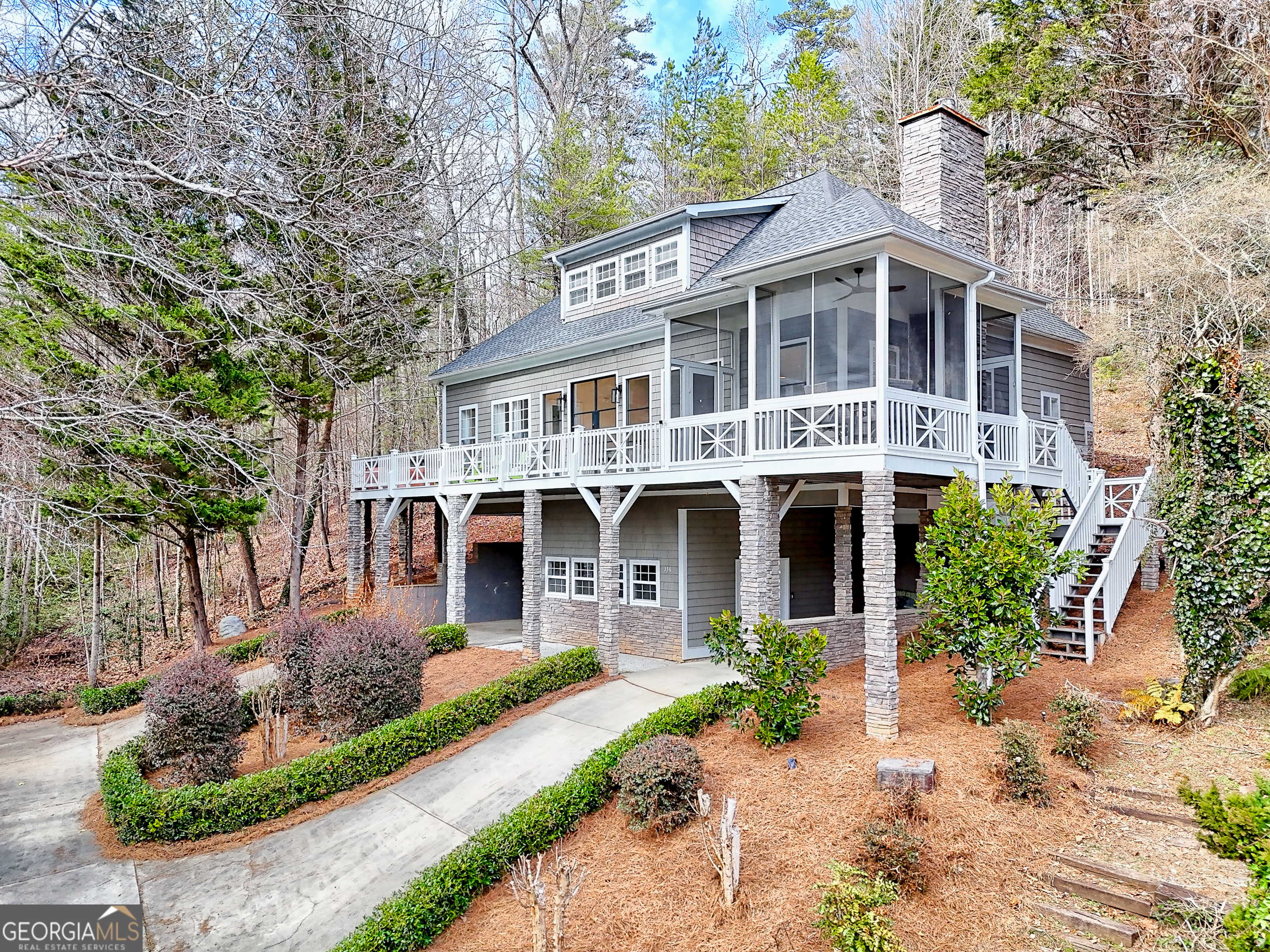 336 Fulton Road Tiger, GA 30576 - Photo 43 of 52 a front view of a house with a garden