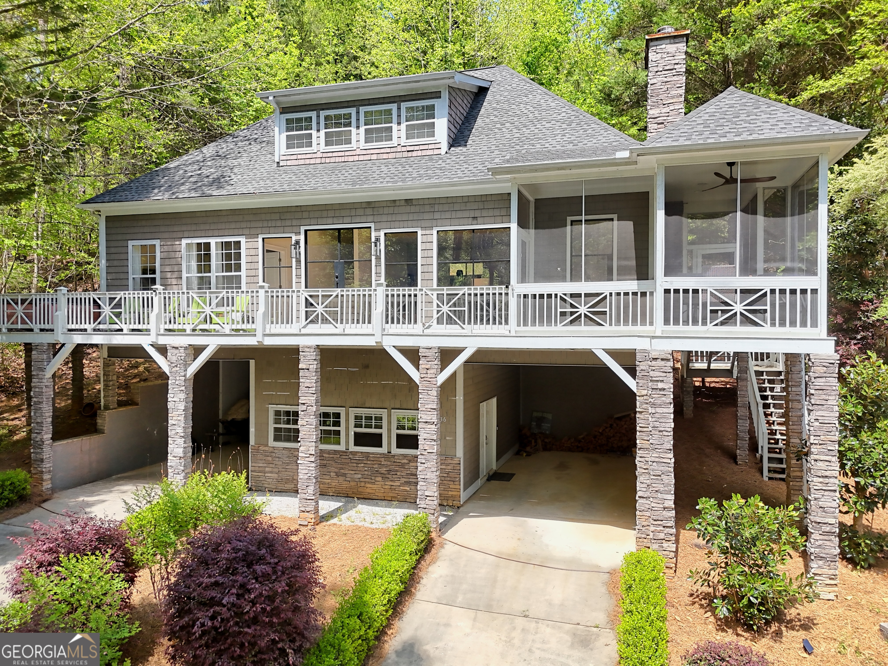 336 Fulton Road Tiger, GA 30576 - Photo 44 of 52 a front view of a house with a garden and porch