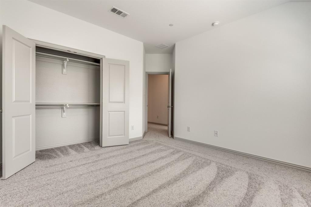 8913 Swallowtail Street Frisco, TX 75035 - Photo 17 of 38 a view of an empty room
