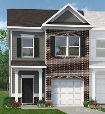 6028 Jasmine Br Road Charlotte, NC 28216 - Photo 26 of 29 a front view of a house with garden