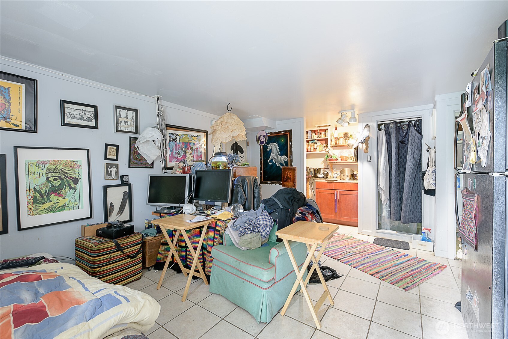 910 East Prospect Street Seattle, WA 98102 - Photo 20 of 25 a view of a livingroom with furniture and a flat screen tv