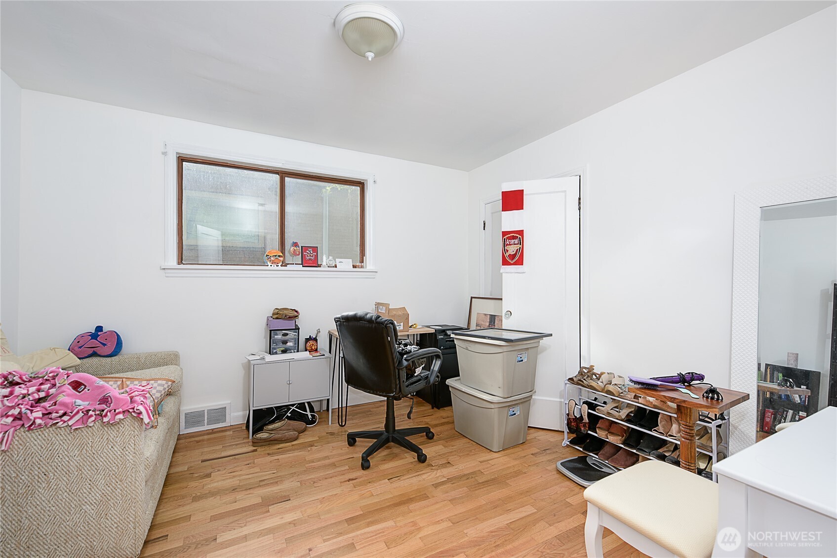 910 East Prospect Street Seattle, WA 98102 - Photo 8 of 25 a view of a workspace with furniture and a window