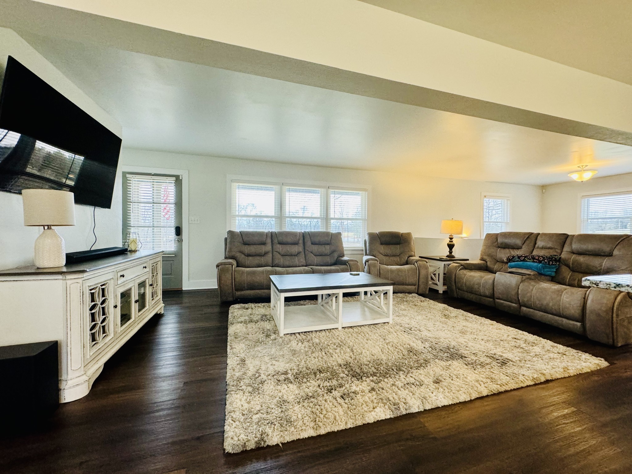1175 Rock Church Road Dickson, TN 37055 - Photo 10 of 60 a living room with furniture and a flat screen tv