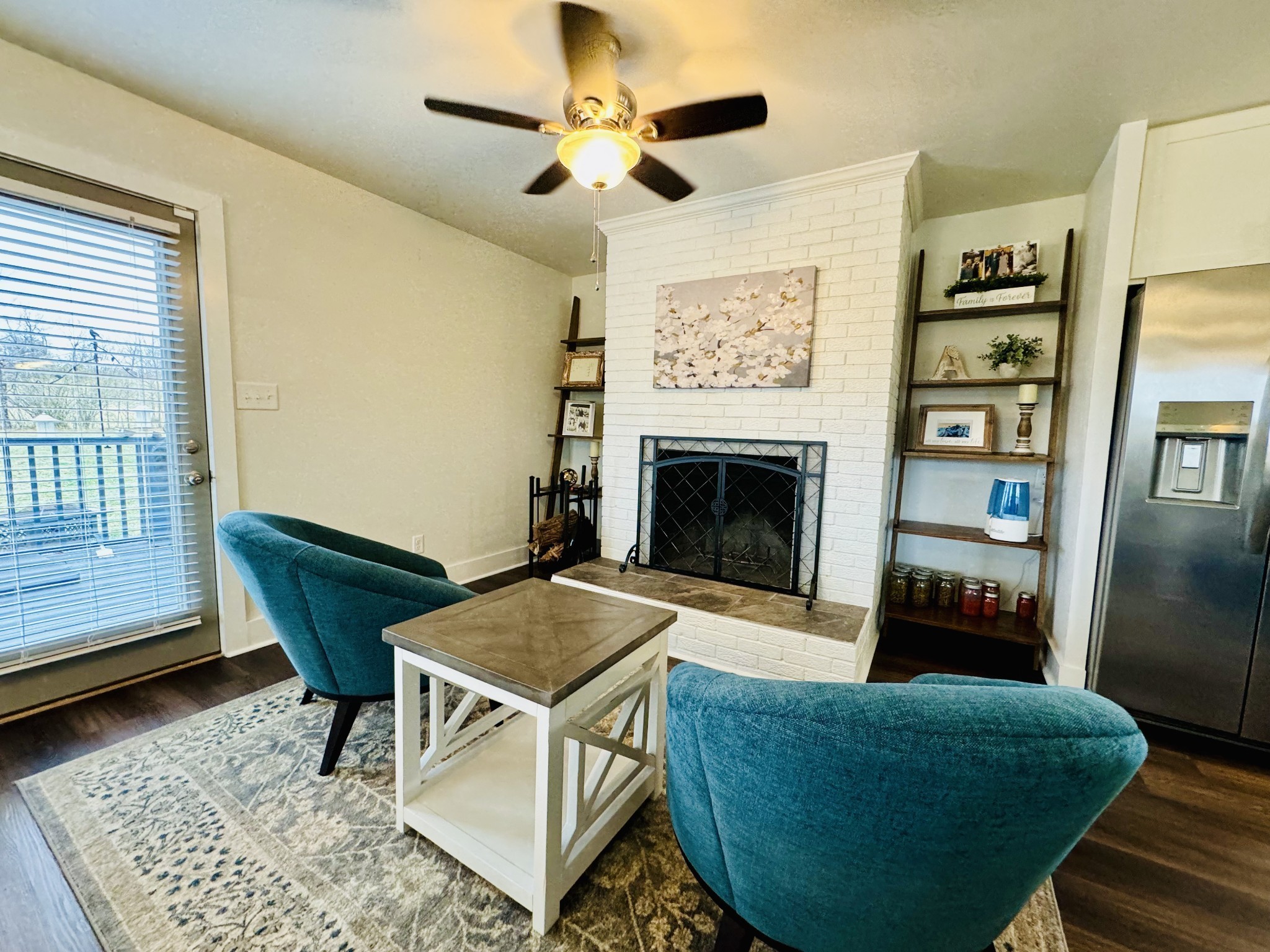 1175 Rock Church Road Dickson, TN 37055 - Photo 12 of 60 a living room with furniture and a fireplace