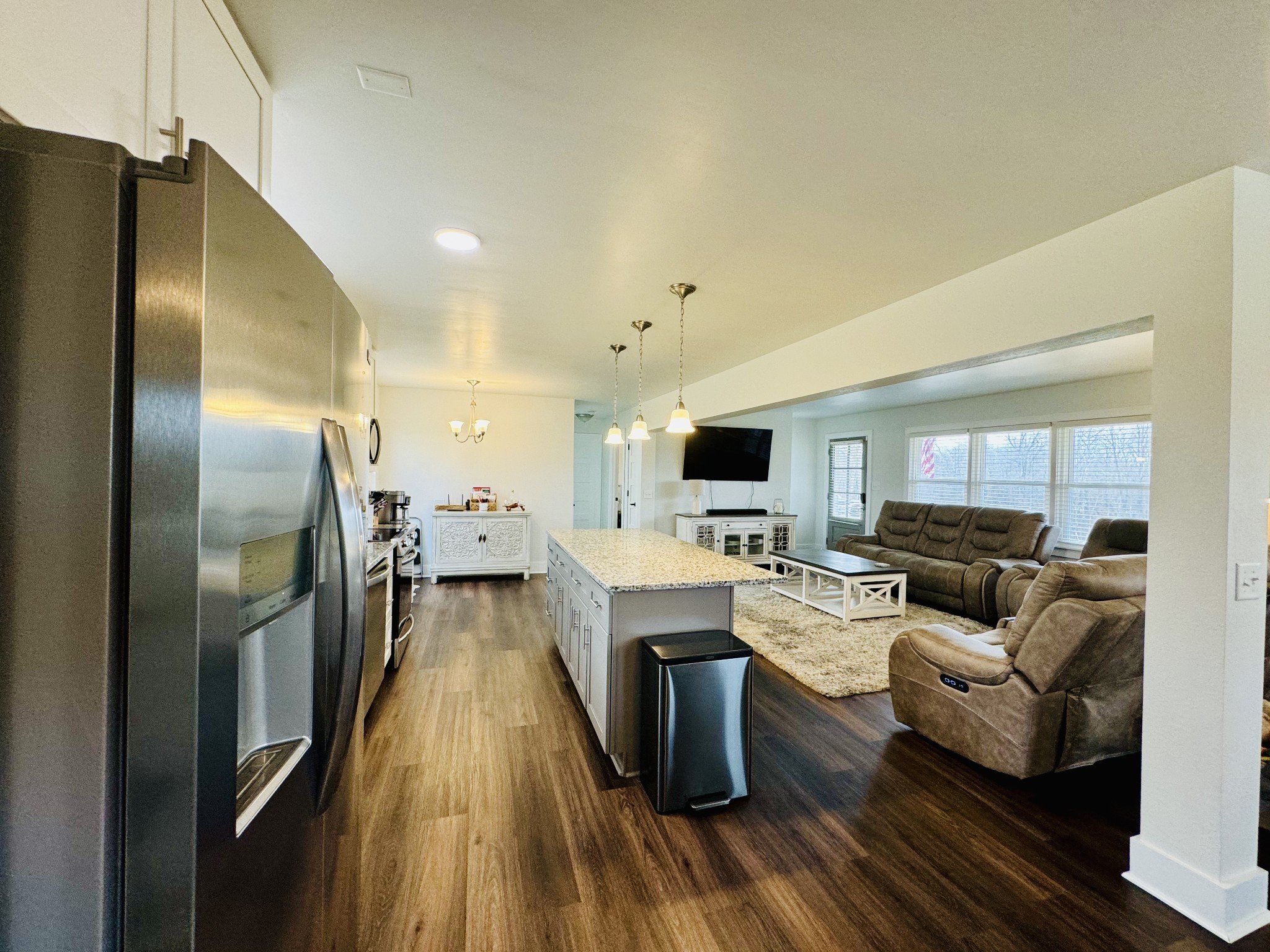 1175 Rock Church Road Dickson, TN 37055 - Photo 22 of 60 a living room with stainless steel appliances furniture and a flat screen tv
