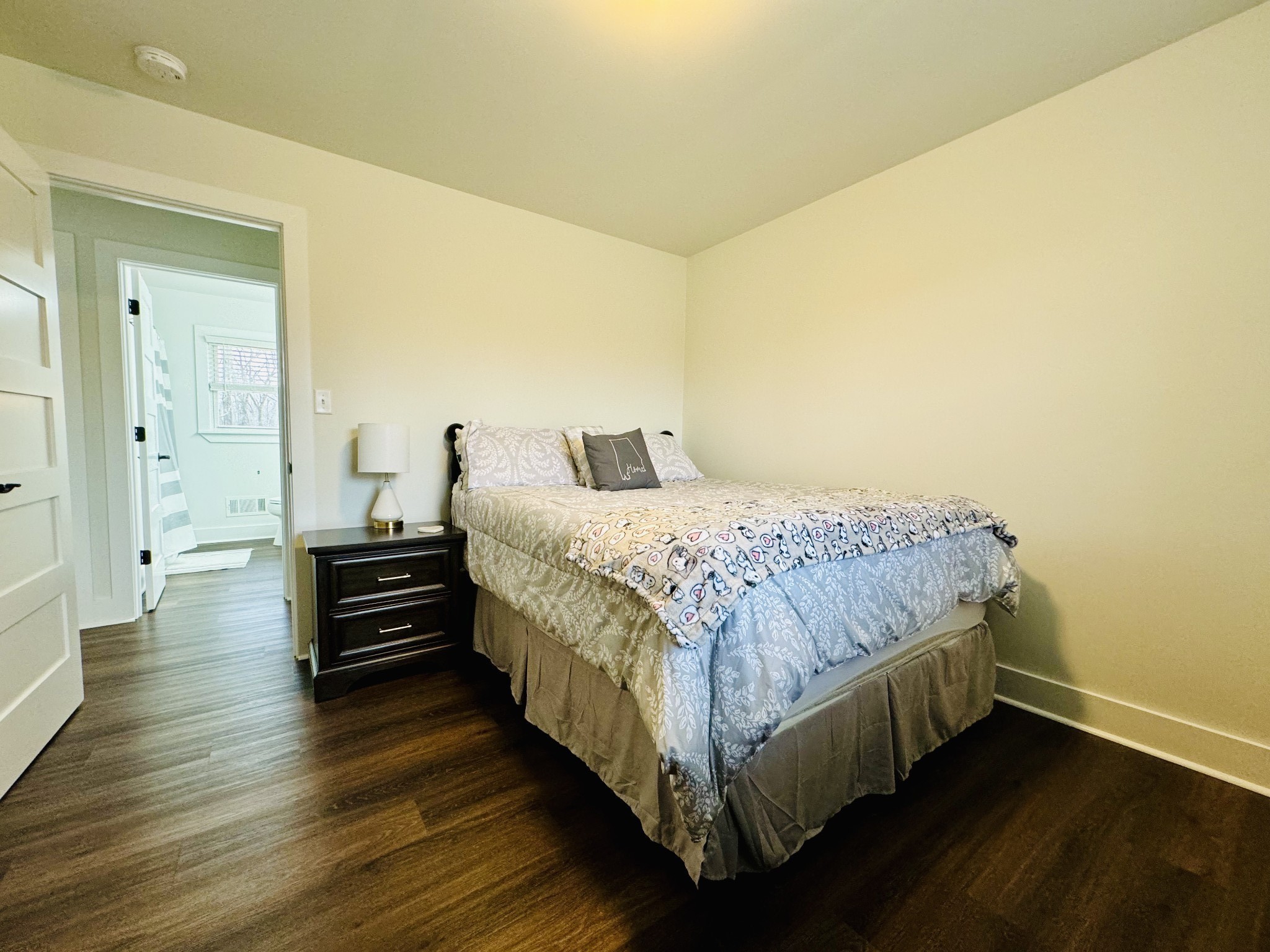 1175 Rock Church Road Dickson, TN 37055 - Photo 26 of 60 a bedroom with a bed and wooden floor