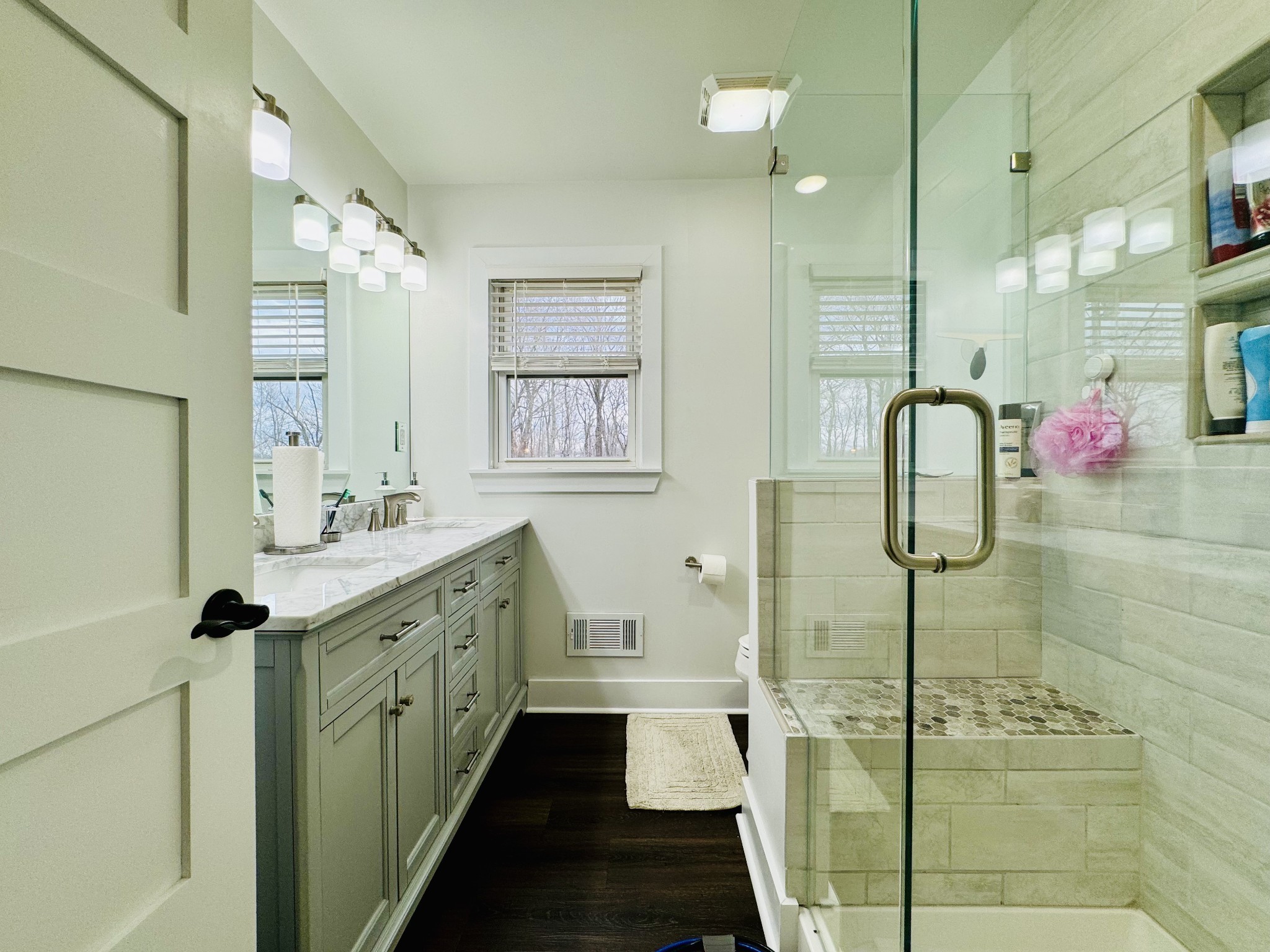 1175 Rock Church Road Dickson, TN 37055 - Photo 28 of 60 a bathroom with a double vanity sink mirror and shower