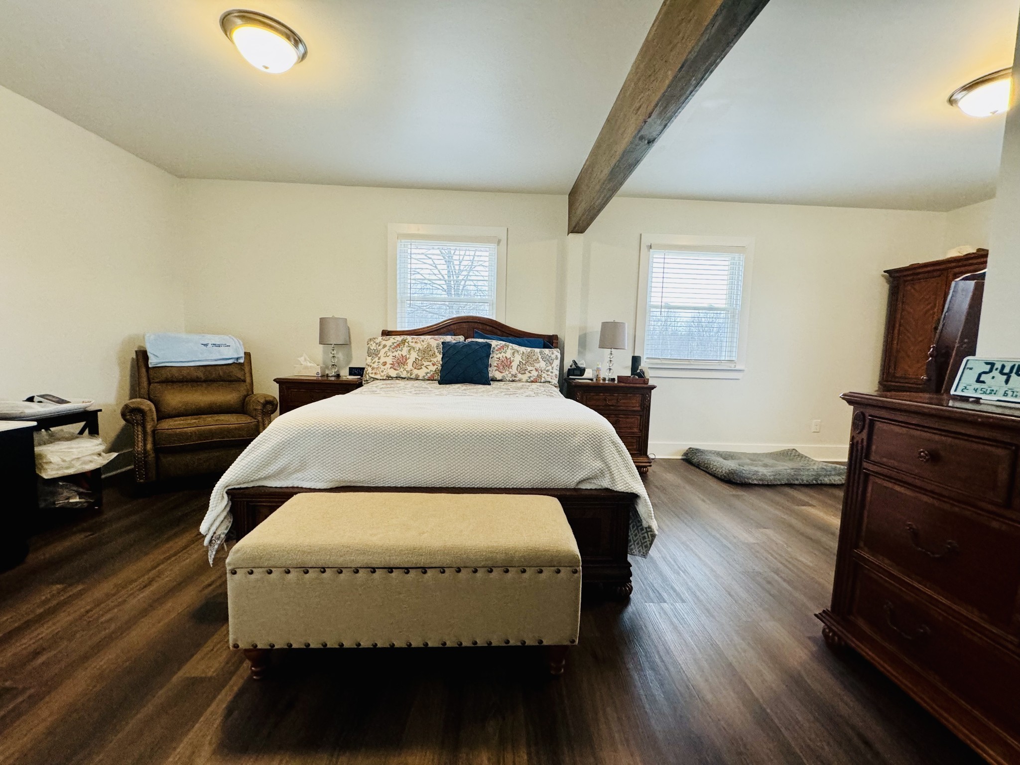 1175 Rock Church Road Dickson, TN 37055 - Photo 32 of 60 a spacious bedroom with a bed and wooden floor