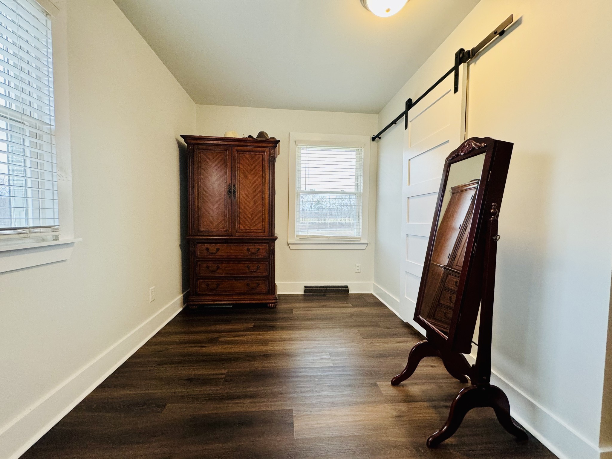 1175 Rock Church Road Dickson, TN 37055 - Photo 36 of 60 a view of a hallway with wooden floor and stairs