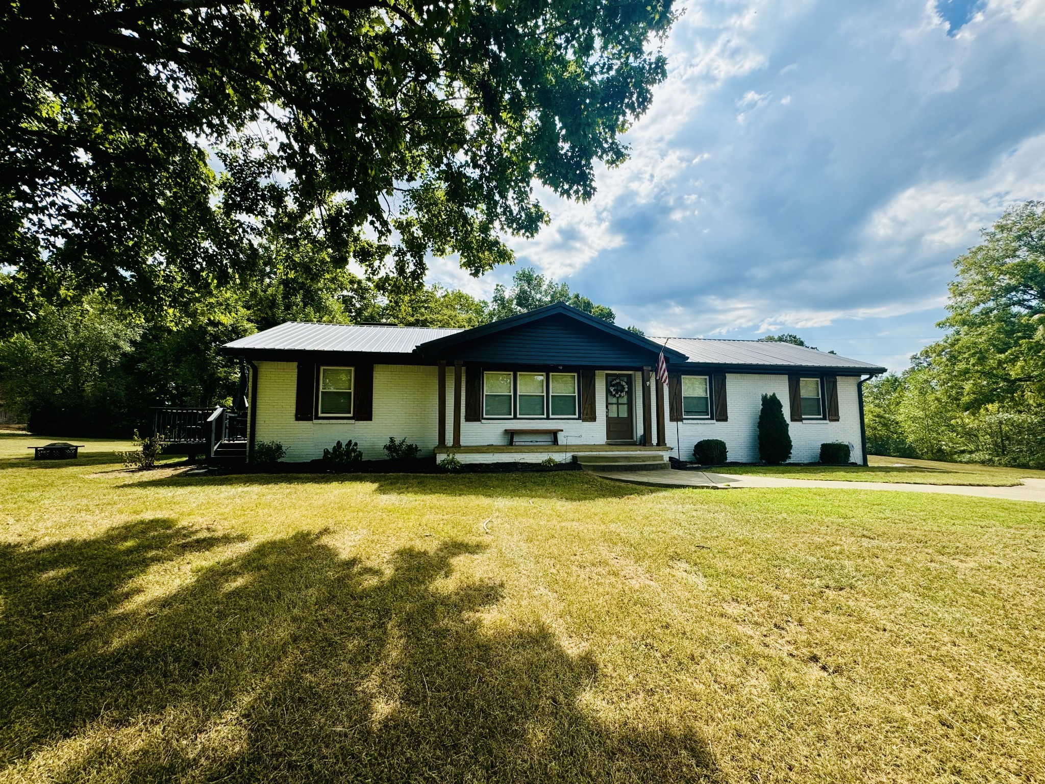 1175 Rock Church Road Dickson, TN 37055 - Photo 5 of 60 a front view of a house with a yard