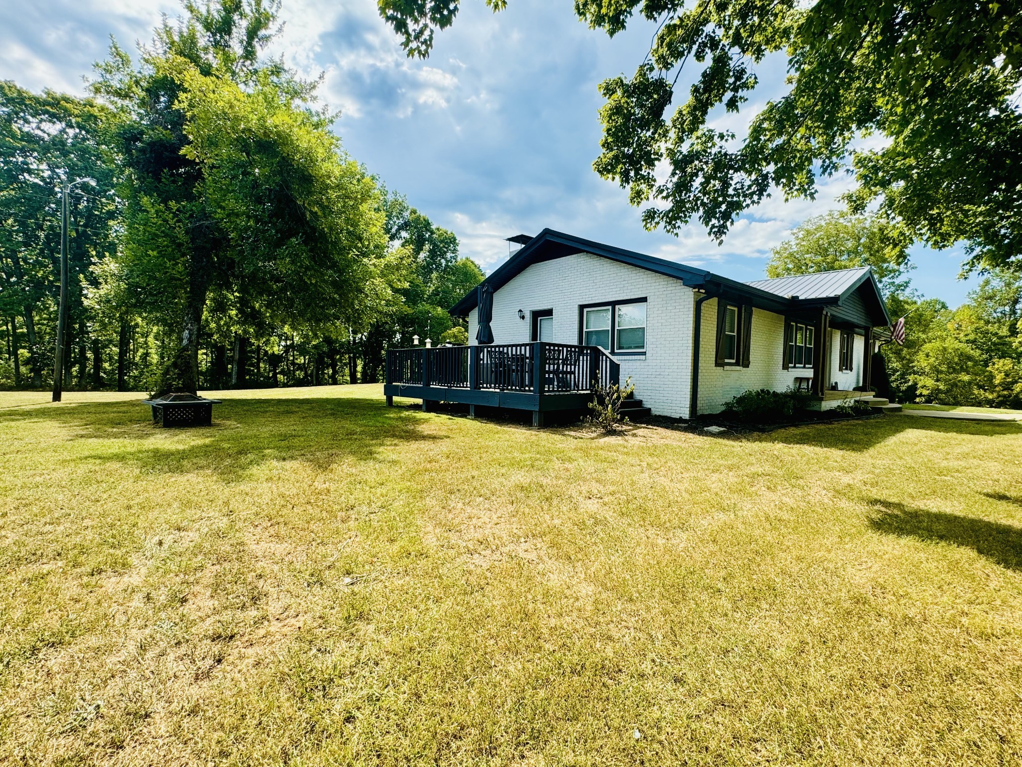 1175 Rock Church Road Dickson, TN 37055 - Photo 50 of 60 a front view of a house with a yard