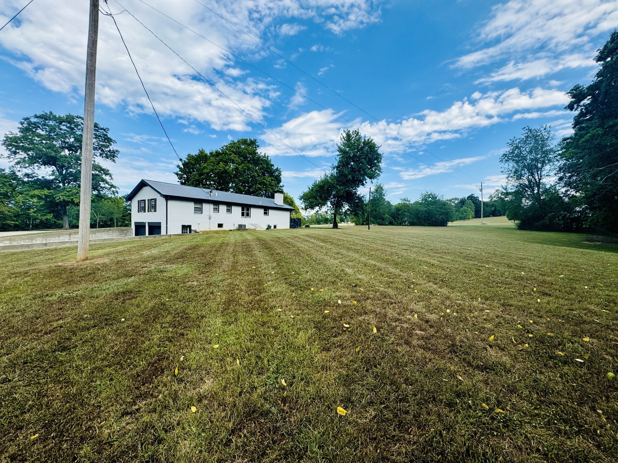 1175 Rock Church Road Dickson, TN 37055 - Photo 56 of 60 a view of a house with a big yard