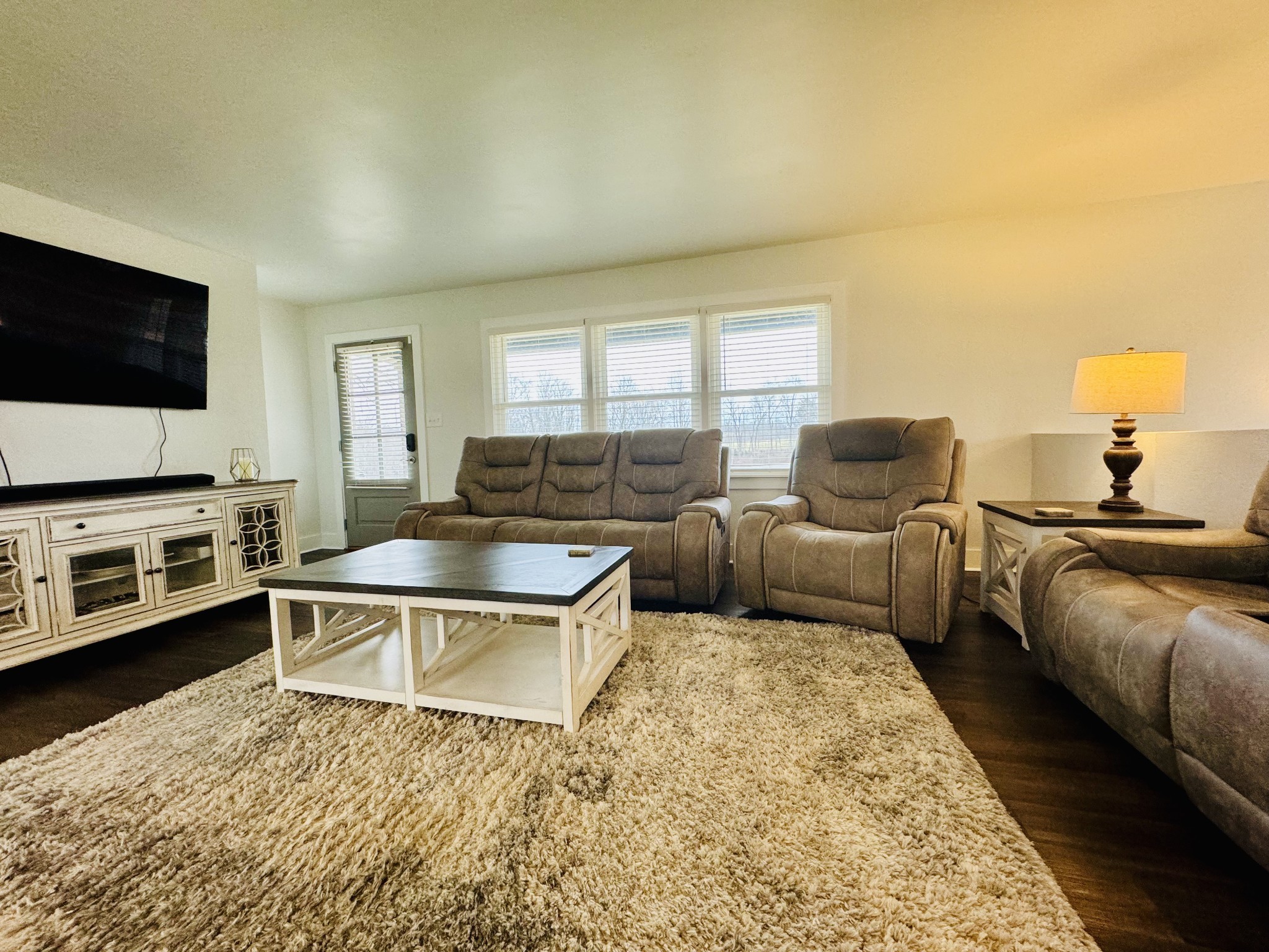 1175 Rock Church Road Dickson, TN 37055 - Photo 9 of 60 a living room with furniture and a flat screen tv