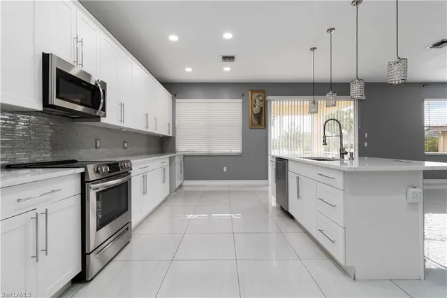 $625,000 | 14215 Manchester Drive, Naples, FL 34114