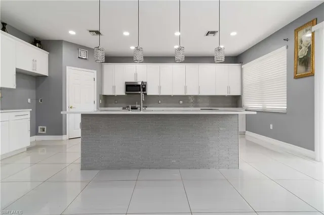 $625,000 | 14215 Manchester Drive, Naples, FL 34114