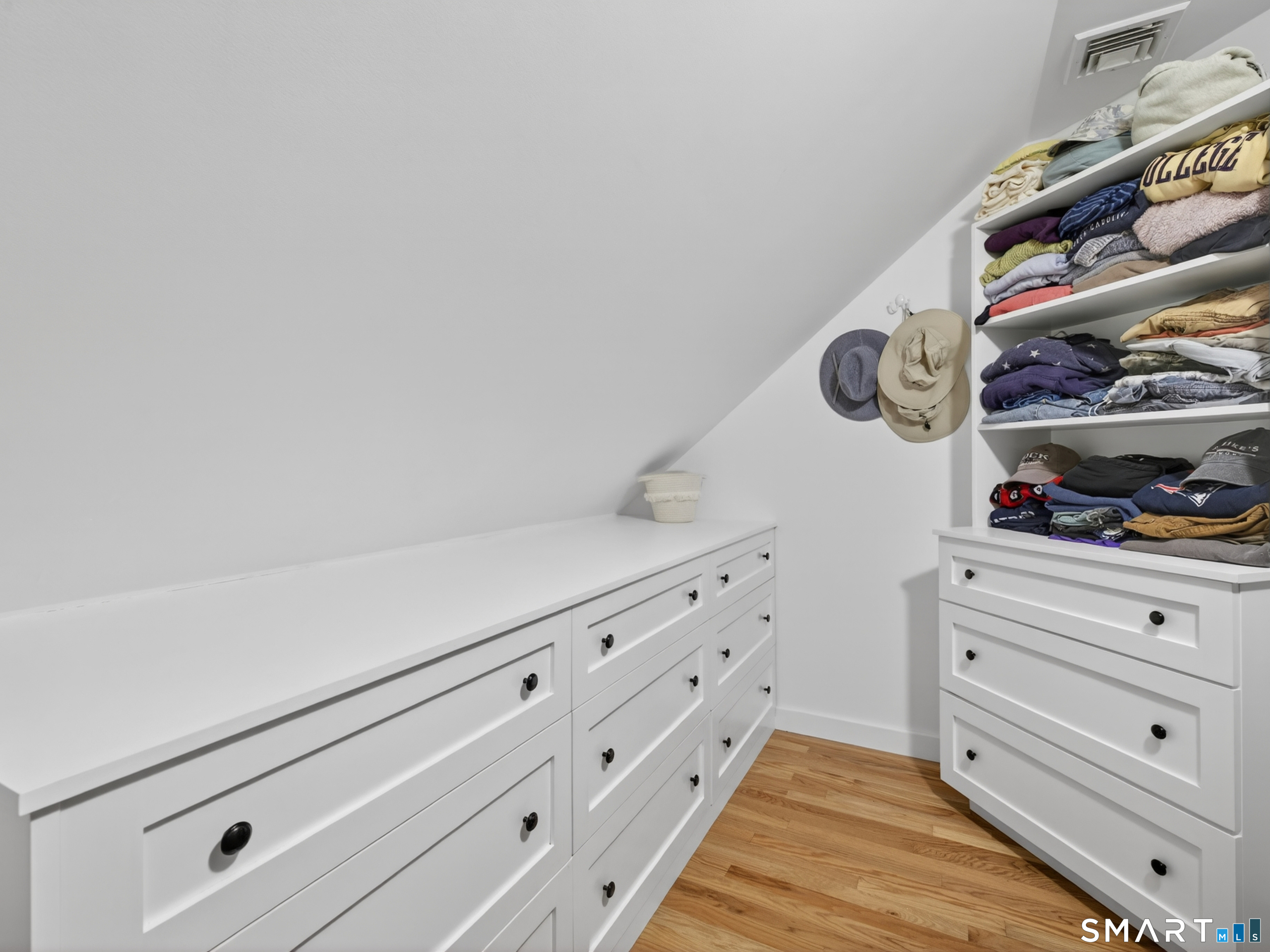 82 Pratt Road Clinton, CT 06413 - Photo 26 of 40 Primary bedroom walk in closet