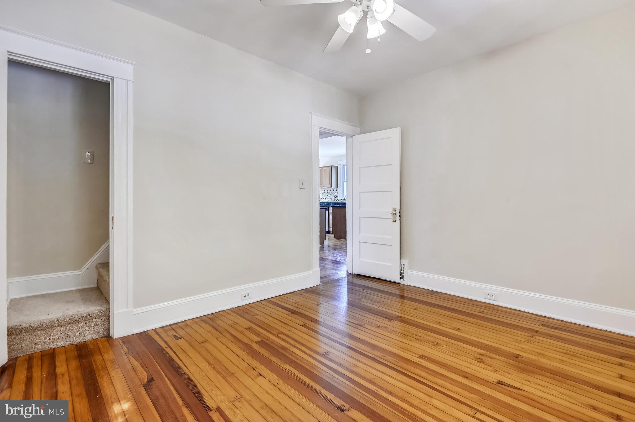 1110 Overbrook Road Baltimore, MD 21239 - Photo 22 of 36 Stairs in den leading to 2nd floor.