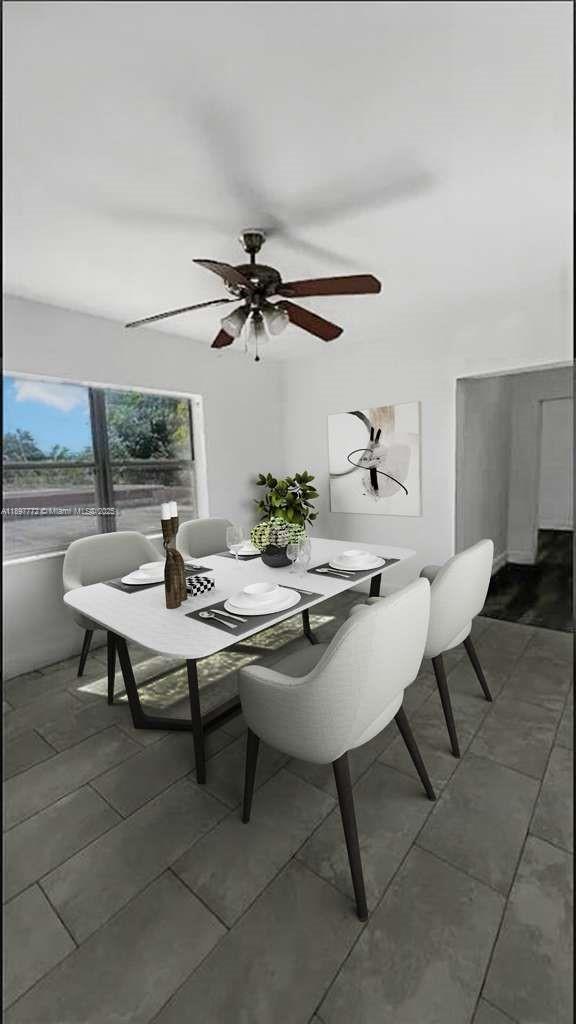 413 Northwest 33rd Street, Unit B Miami, FL 33127 - Photo 7 of 13 a view of a dining room with furniture
