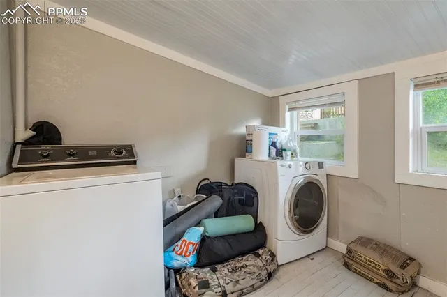 a utility room with dryer and washer