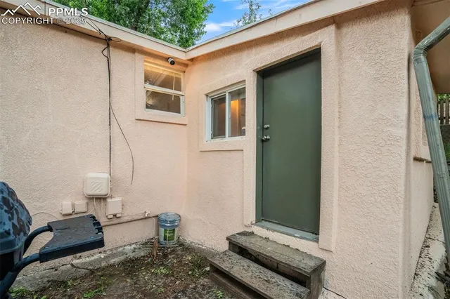 a backyard of a house with seating space