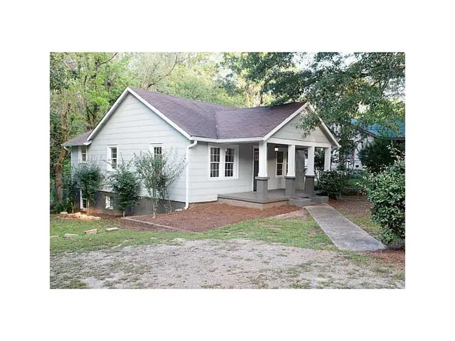 a house that has a lot of plants in it