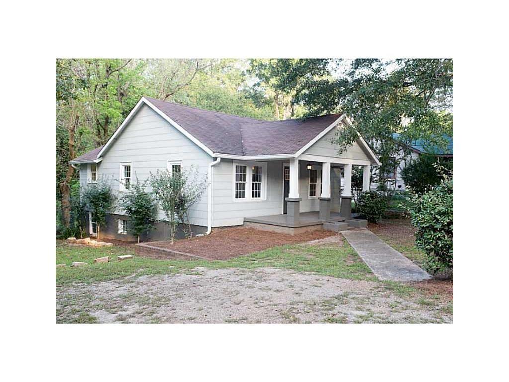 a house that has a lot of plants in it