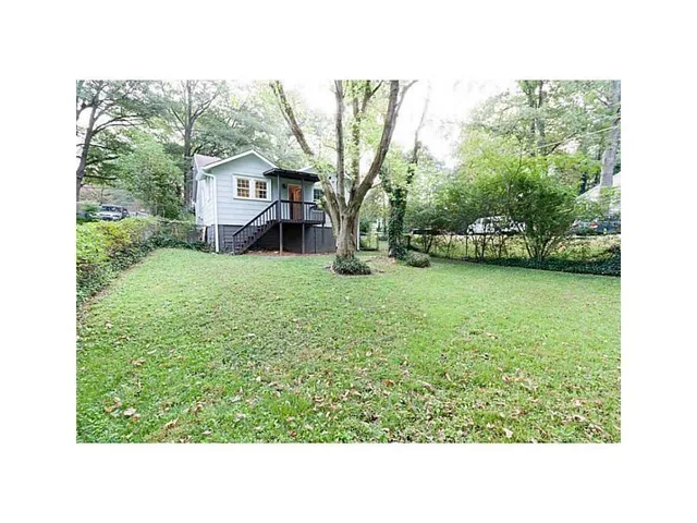 a black and white photo of a house