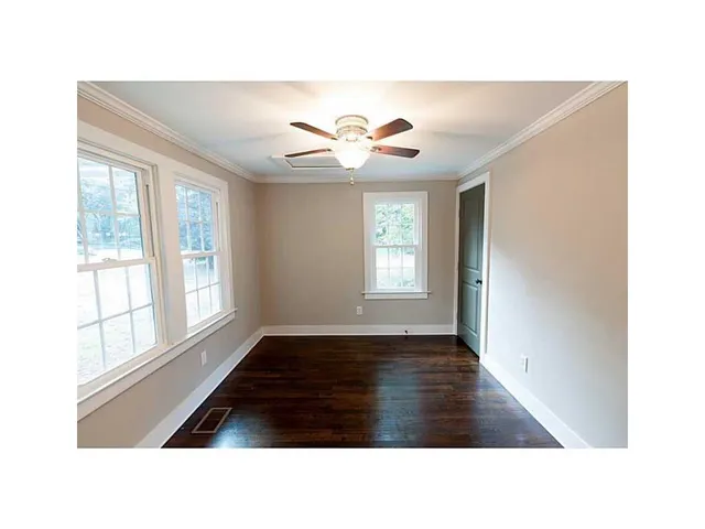 a black and white photo of a living room