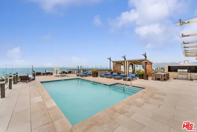 a view of a terrace with seating area and furniture