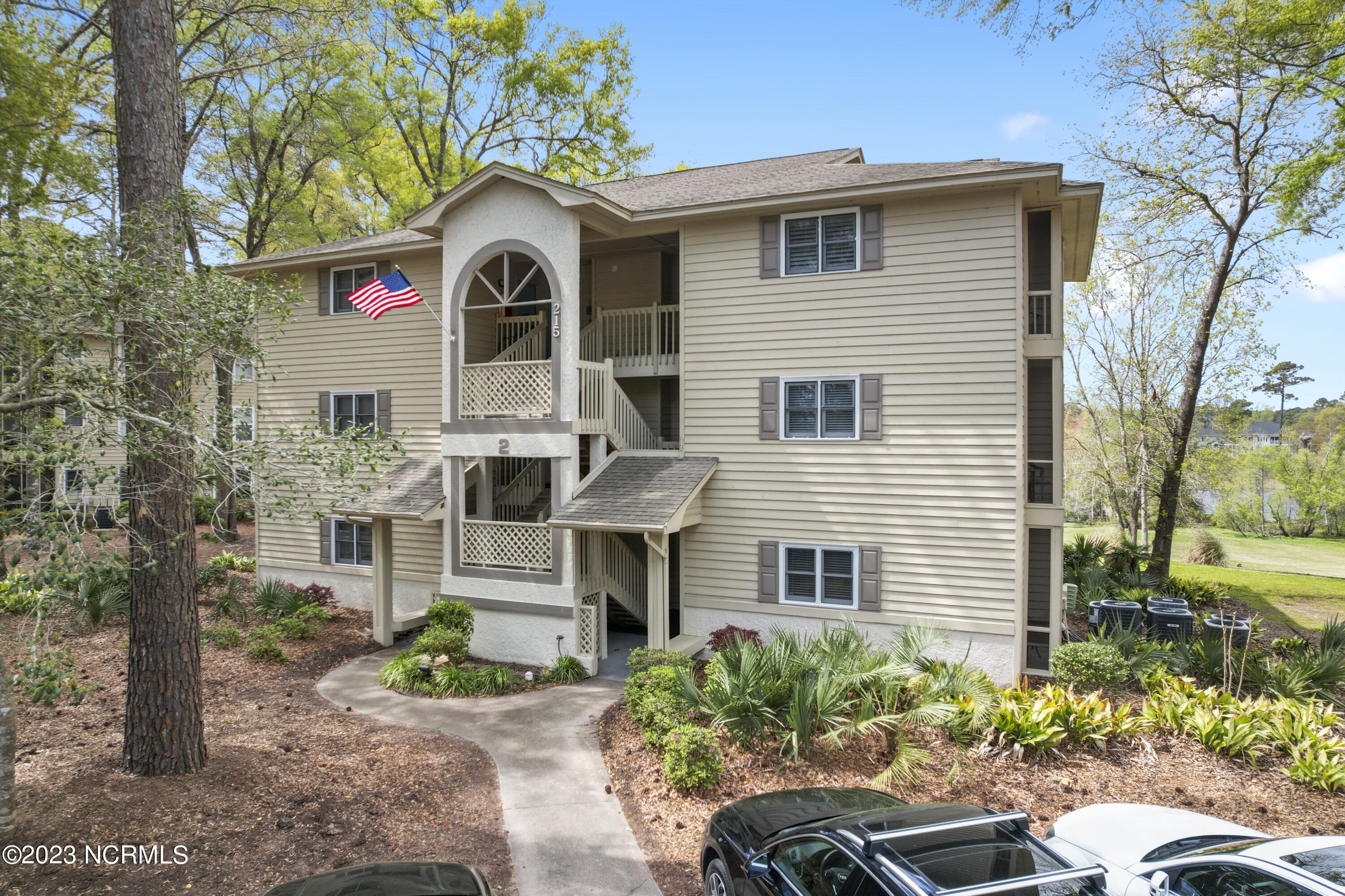 215 Clubhouse Road, Unit 1 Sunset Beach, NC 28468 - Photo 1 of 57 Front of building