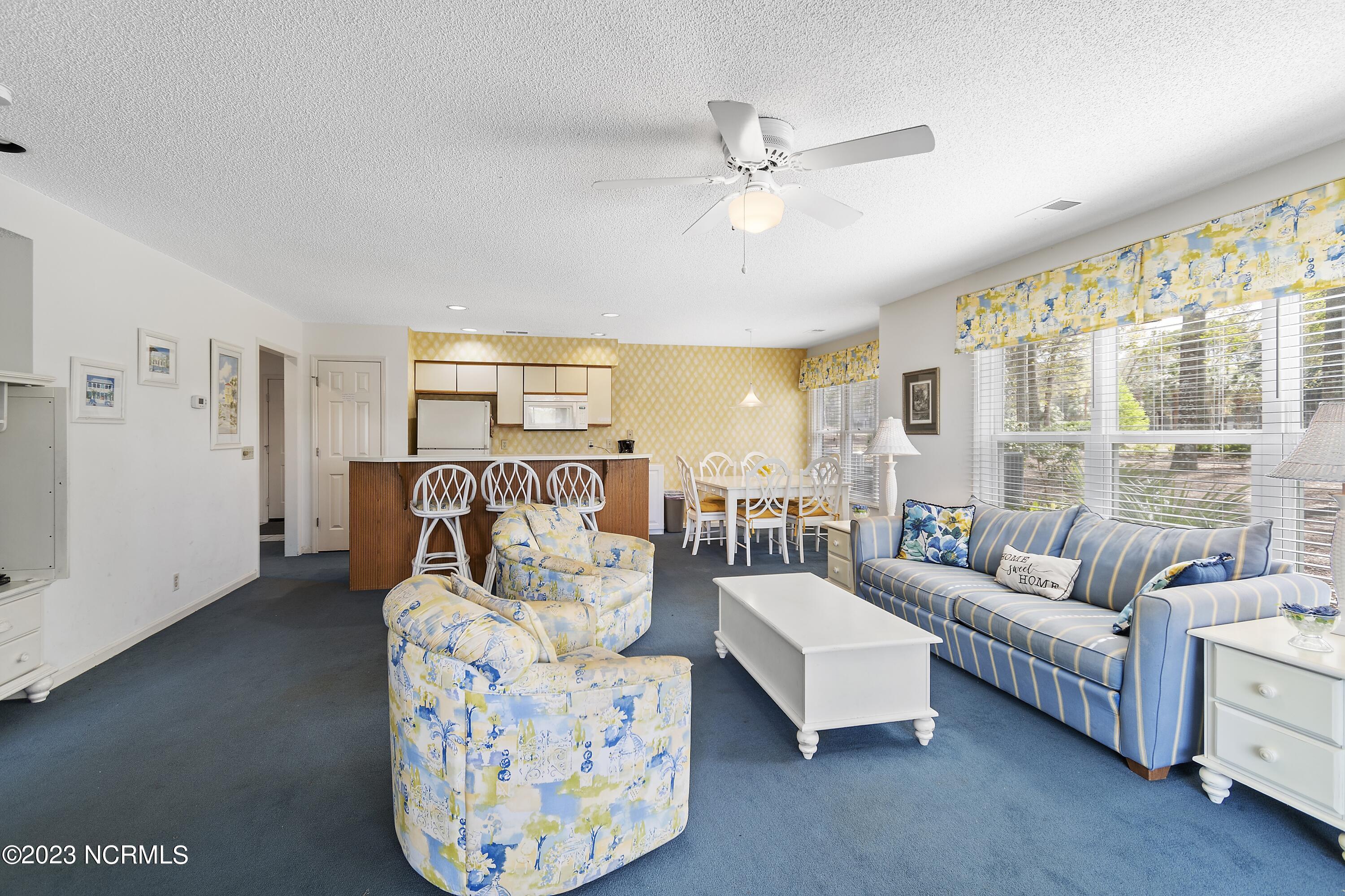 215 Clubhouse Road, Unit 1 Sunset Beach, NC 28468 - Photo 13 of 57 Living room