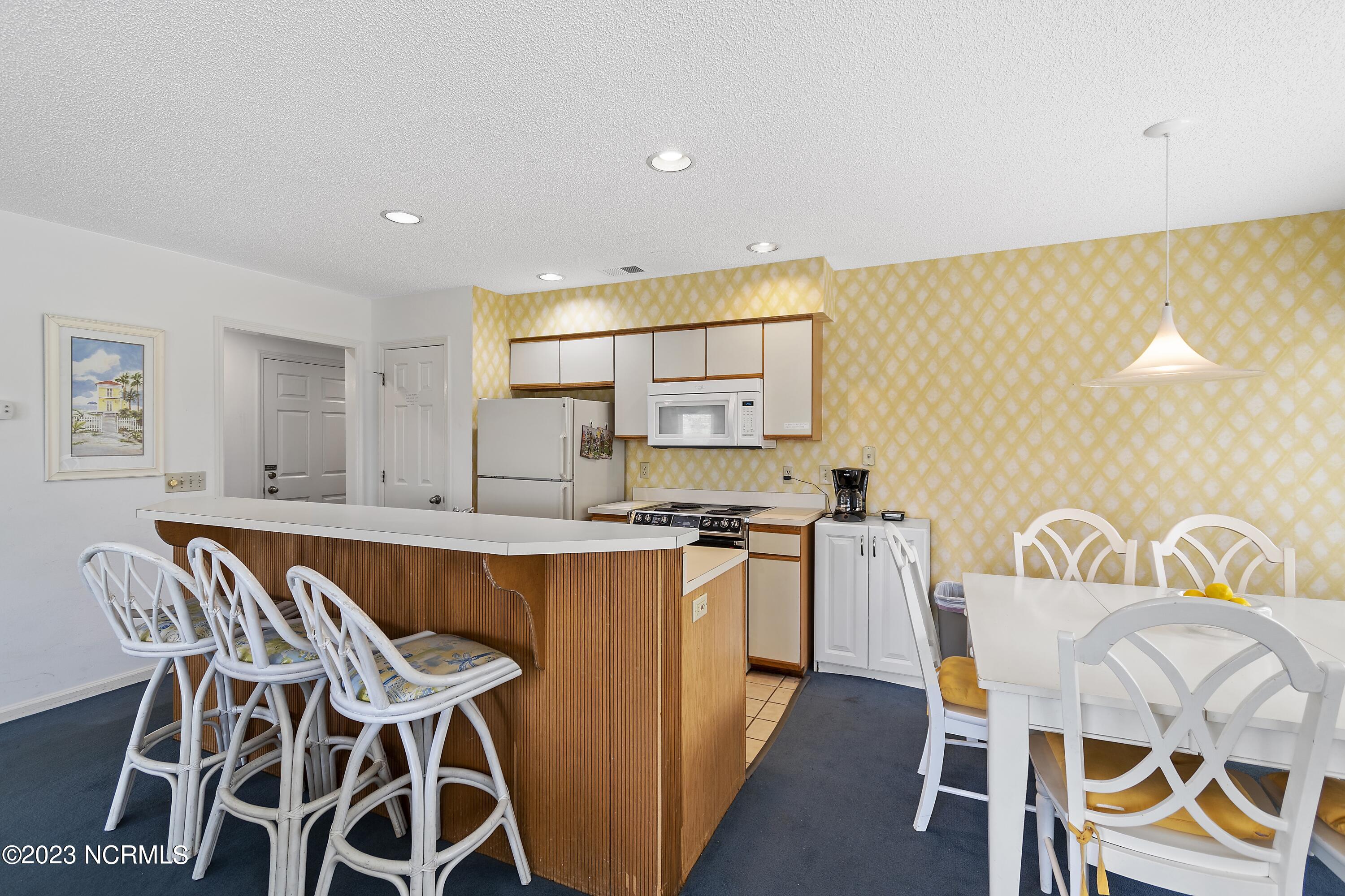 215 Clubhouse Road, Unit 1 Sunset Beach, NC 28468 - Photo 14 of 57 Kitchen/Dining