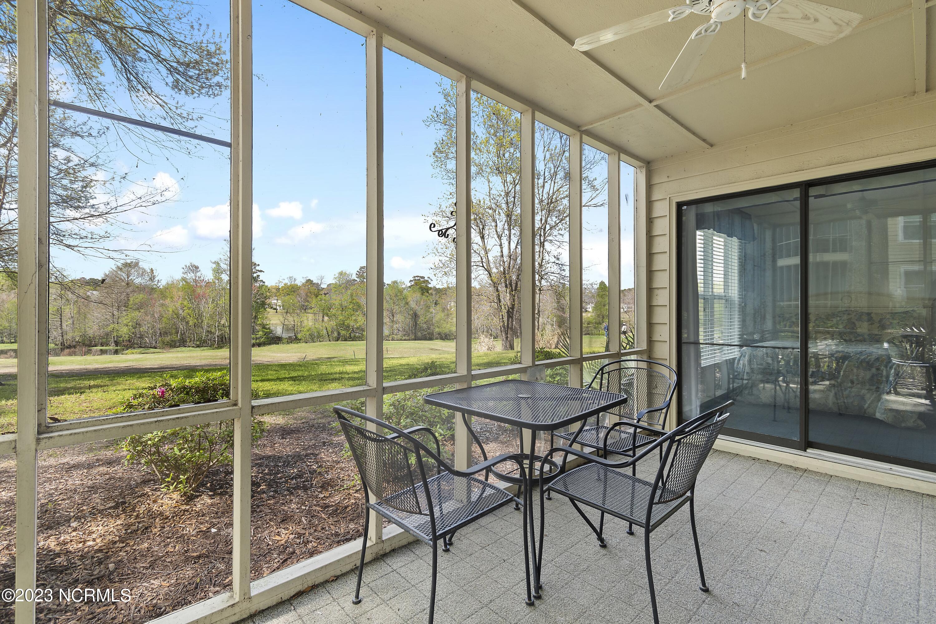 215 Clubhouse Road, Unit 1 Sunset Beach, NC 28468 - Photo 20 of 57 Screened porch