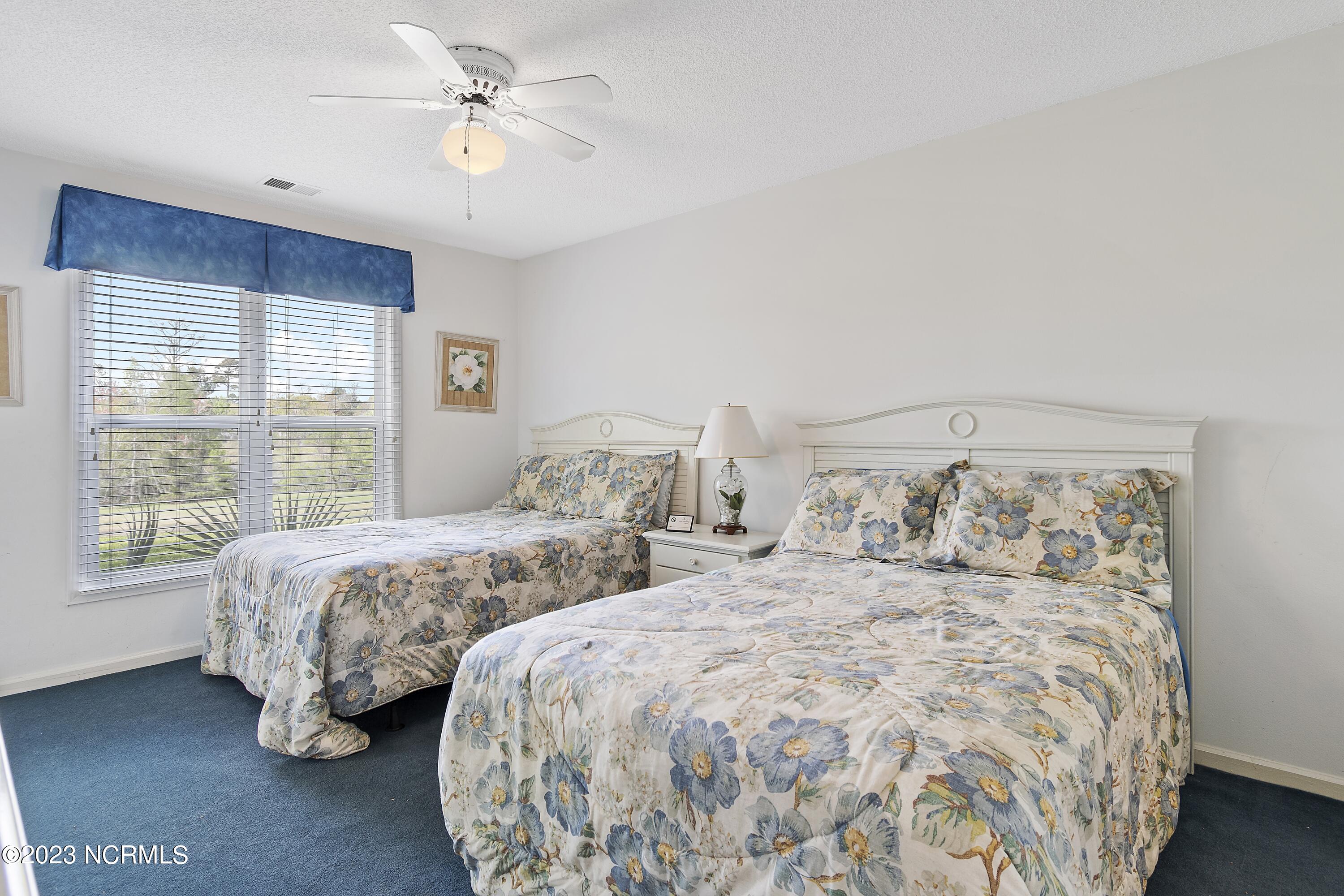 215 Clubhouse Road, Unit 1 Sunset Beach, NC 28468 - Photo 21 of 57 Master bedroom