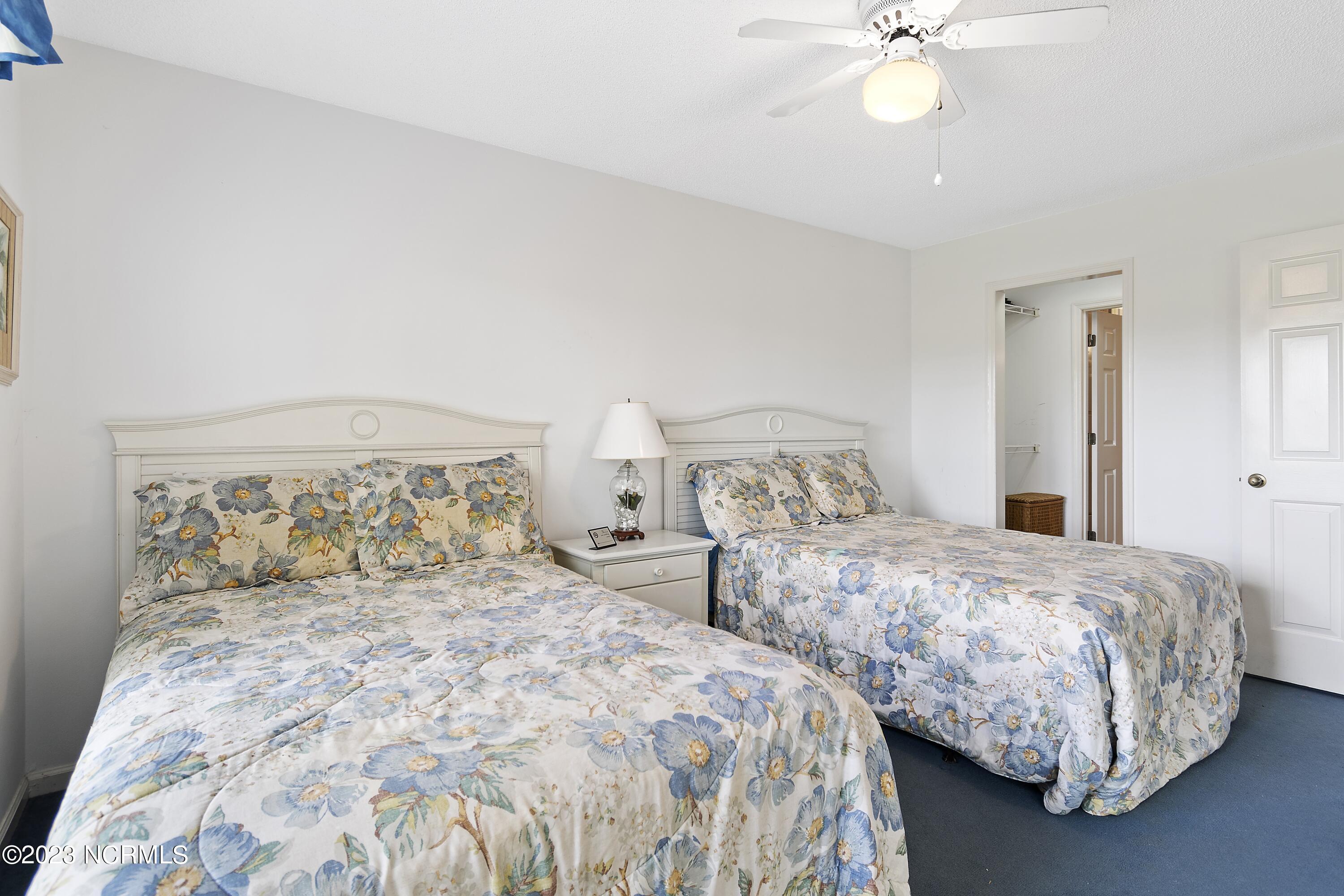215 Clubhouse Road, Unit 1 Sunset Beach, NC 28468 - Photo 23 of 57 Master bedroom