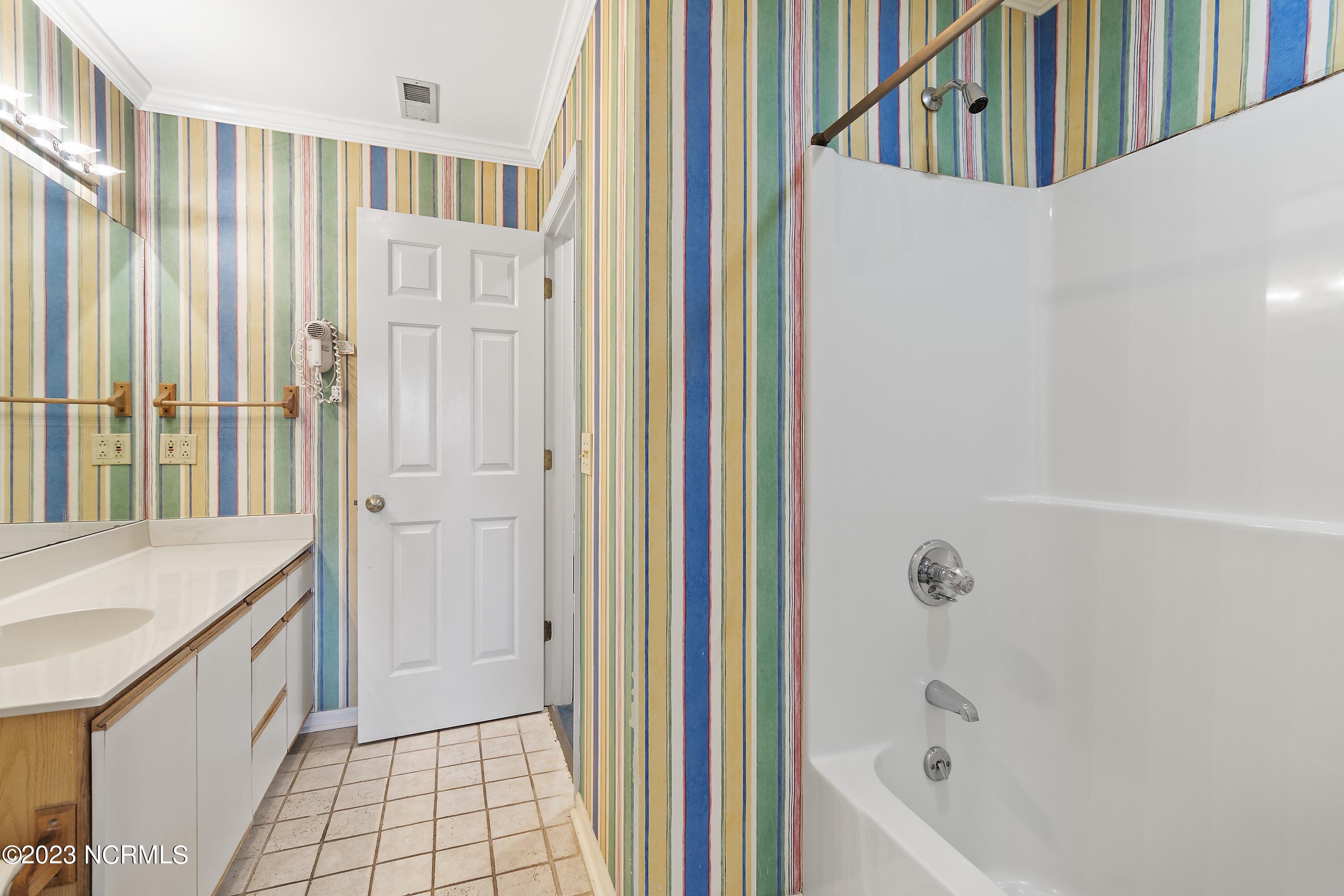 215 Clubhouse Road, Unit 1 Sunset Beach, NC 28468 - Photo 24 of 57 Master bathroom