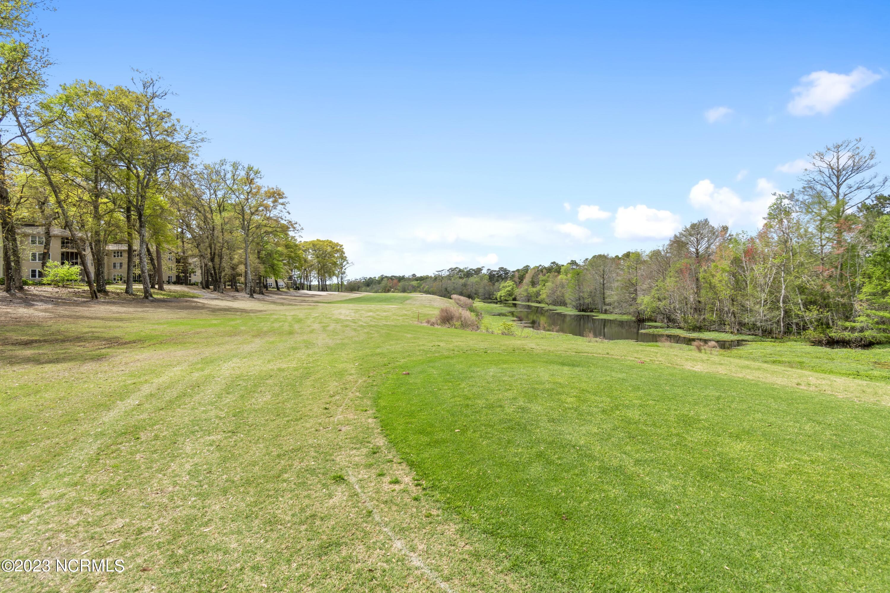215 Clubhouse Road, Unit 1 Sunset Beach, NC 28468 - Photo 37 of 57 Golf course view